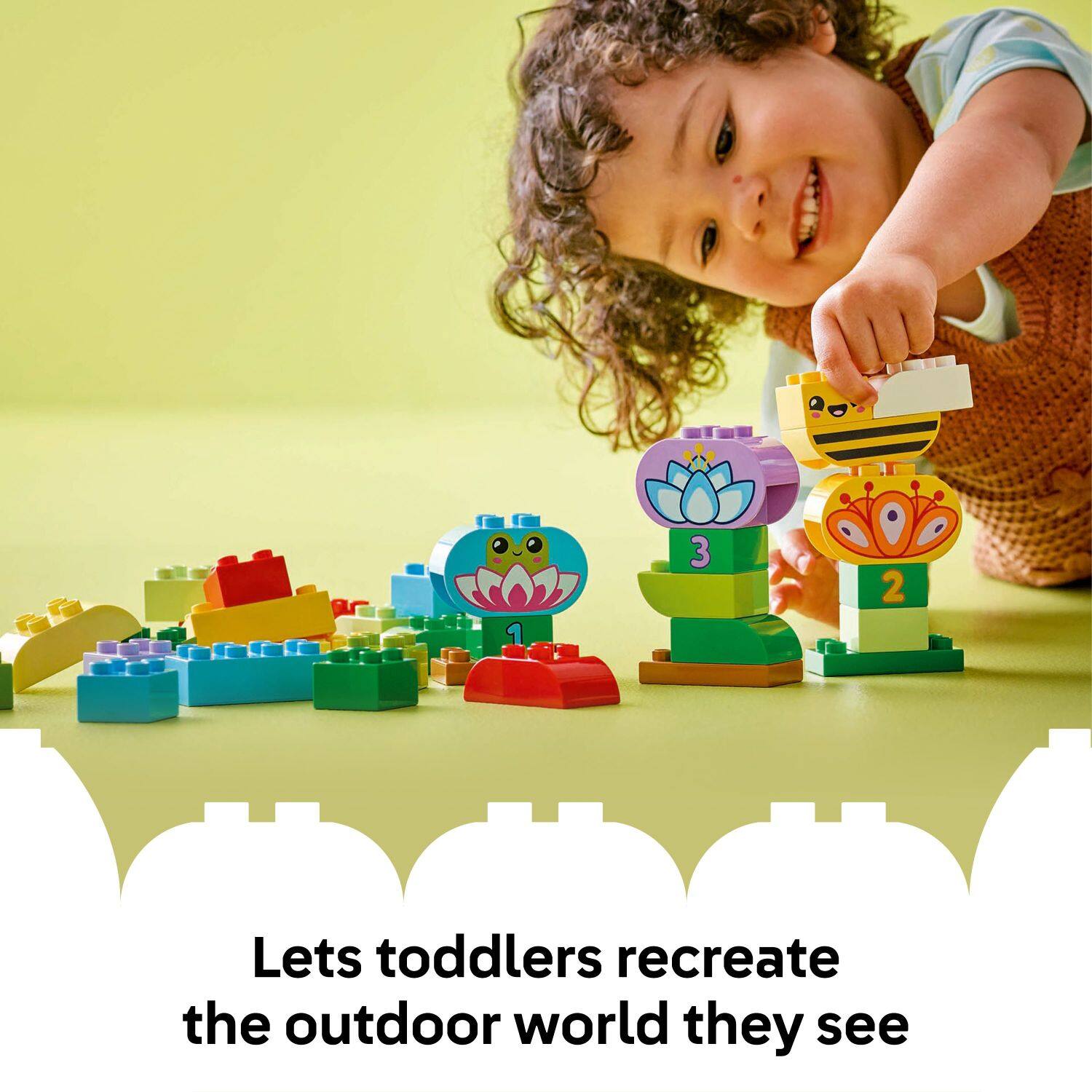 I 1 3 2 Lets toddlers recreate the outdoor world they see.