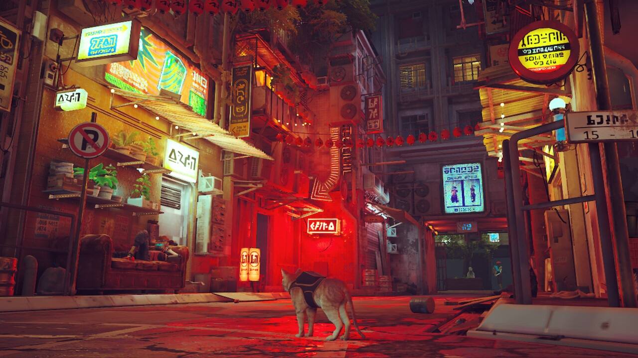 The image features a dog standing on a street in a city. The dog is located near the center of the scene, with its head turned to the right. The street is surrounded by buildings, and there are several signs visible in the background. The signs are of various sizes and are placed at different heights and positions along the street. Additionally, there is a person standing on the left side of the scene, and a bench is located further back on the right side.