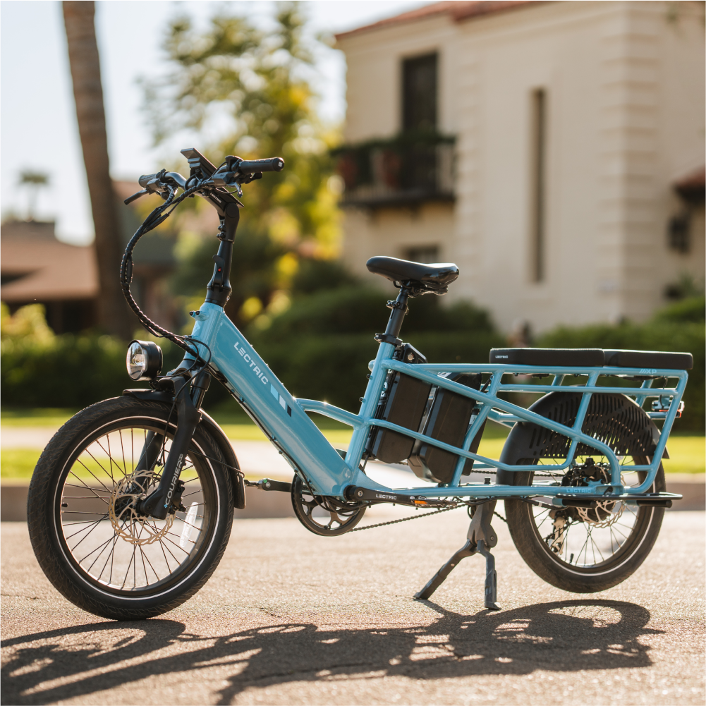 The text on the image reads "Electric - Lessest Costs."