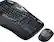 A Logitech keyboard and mouse are shown. The keyboard has a black color and features a wrist rest. The mouse is placed next to the keyboard.