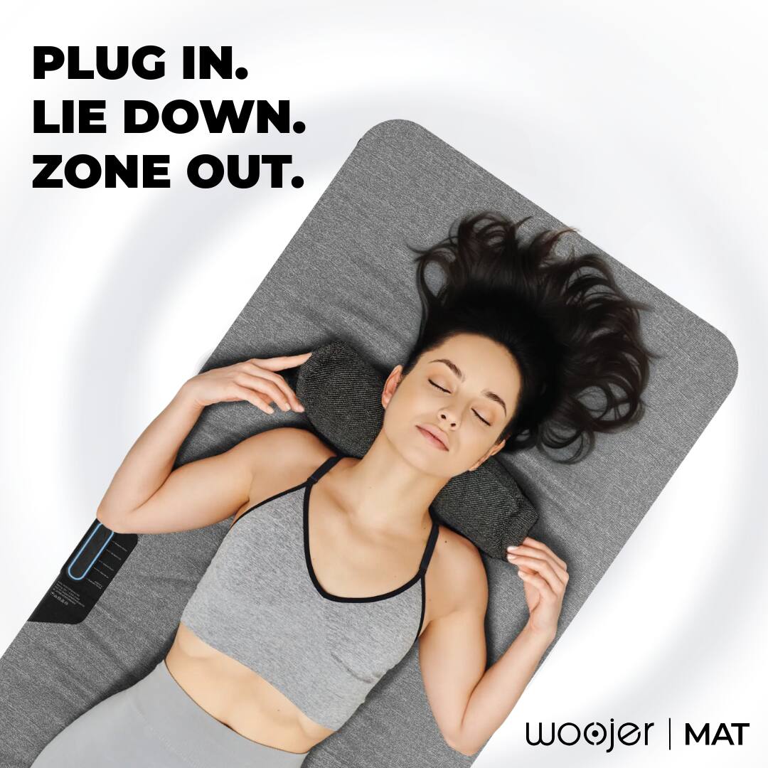 PLUG IN.  
LIE DOWN.  
ZONE OUT.  

woojer | MAT