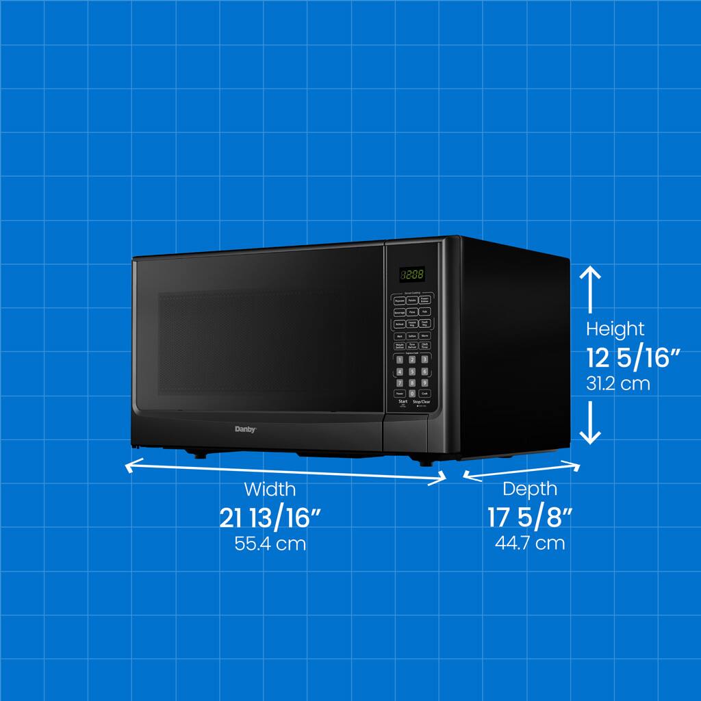 The text on the image reads:

Height: 12 5/16" (31.2 cm)
Width: 21 13/16" (55.4 cm)
Depth: 17 5/8" (44.7 cm)

These measurements are for a microwave oven.