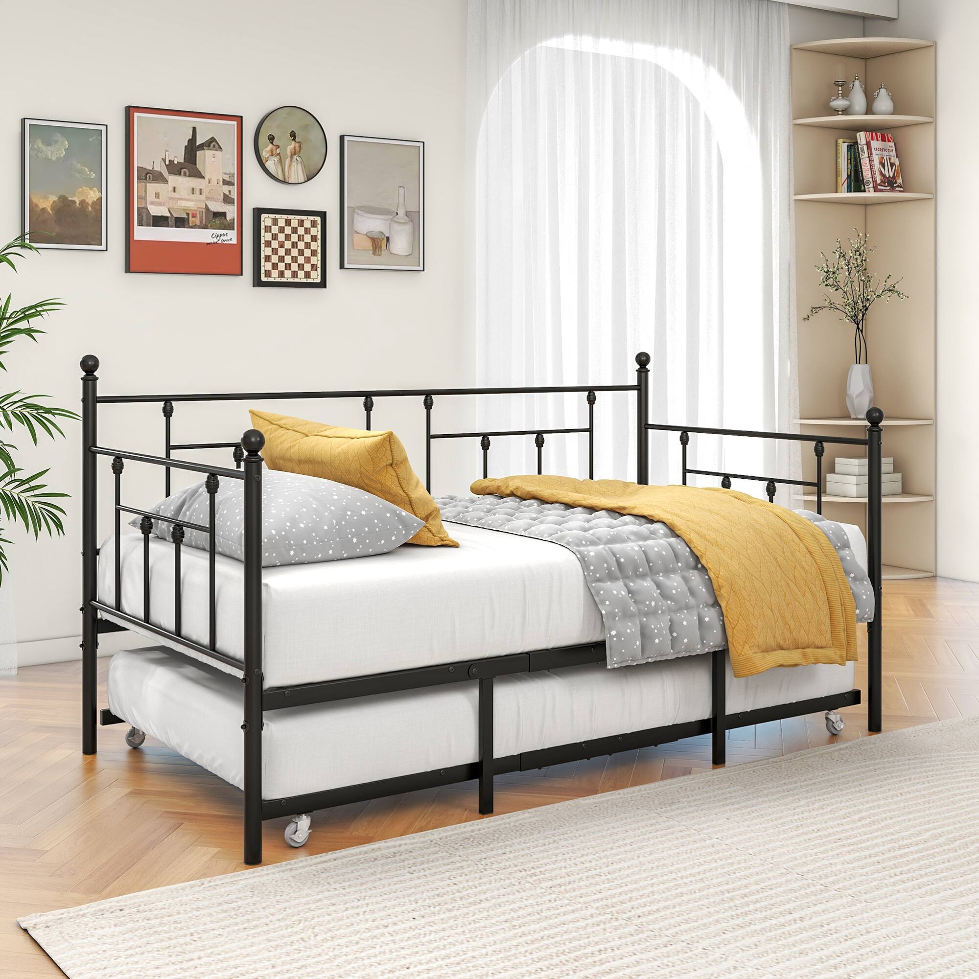 Left. GOODSILO - Twin Size Metal Daybed Frame with Adjustable Trundle Set for Guest Rooms, Bedrooms, and Living Spaces - Black.