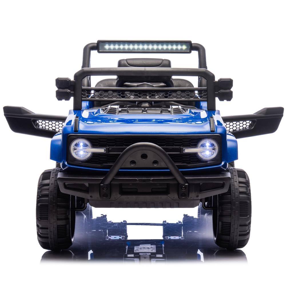 Angle. BreeBe - 12V Kids Ride On 6-Wheel Electric Truck w/ Parent Control, Suspension, 4 Motors, LED Lights, Music, USB, Ages 3-5 - Blue.