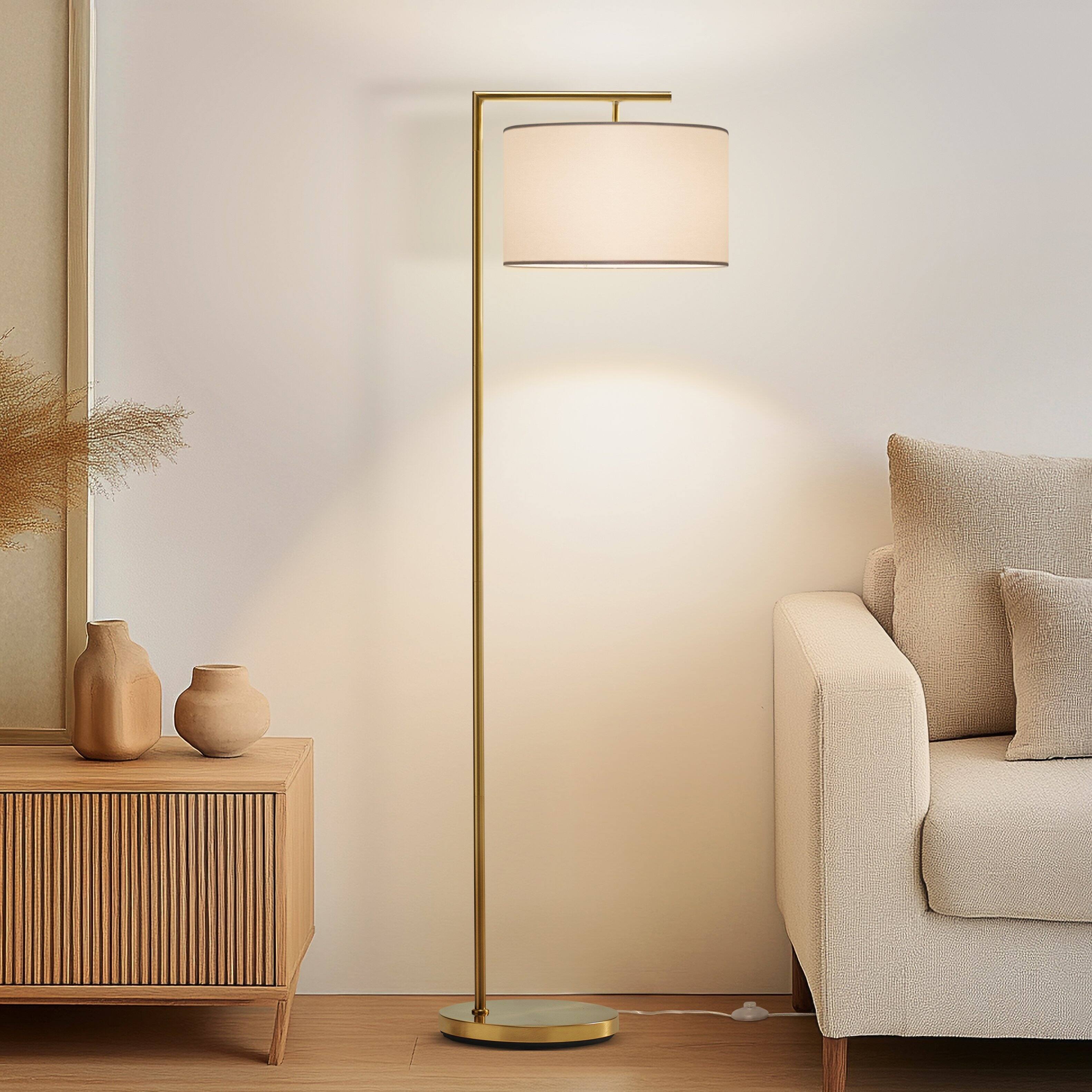 Angle. Brightech - Montage Modern LED Midcentury Modern Arc Super Bright Floor Lamp with Ivory White Fabric Drum Shade - Antiqued Brass.
