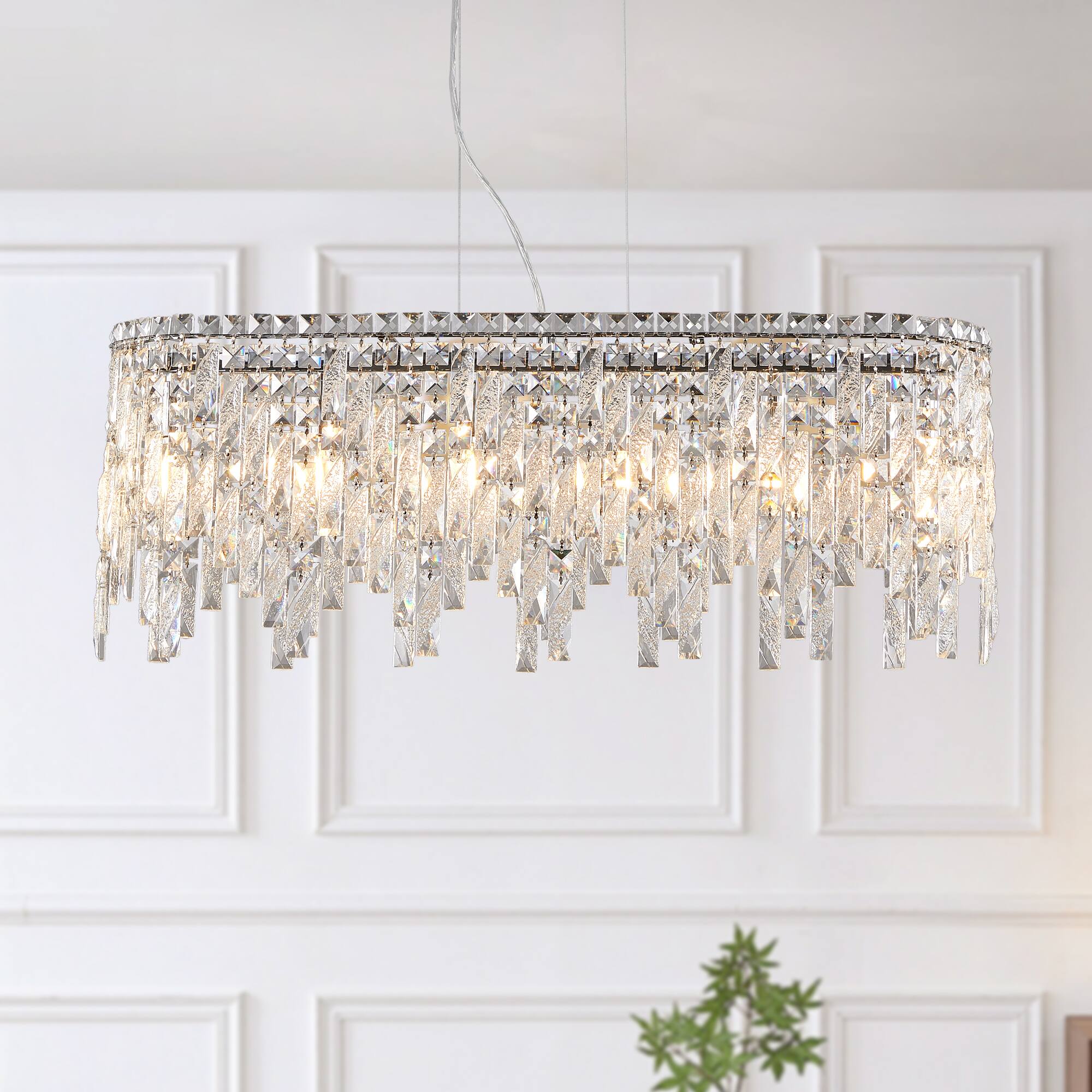Left. Tiramisubest - Silver Elegant Oval Crystal Chandelier, Modern Ceiling Light Fixture with Reflective Hanging Crystals (No Bulbs) - Chrome,Transparent.