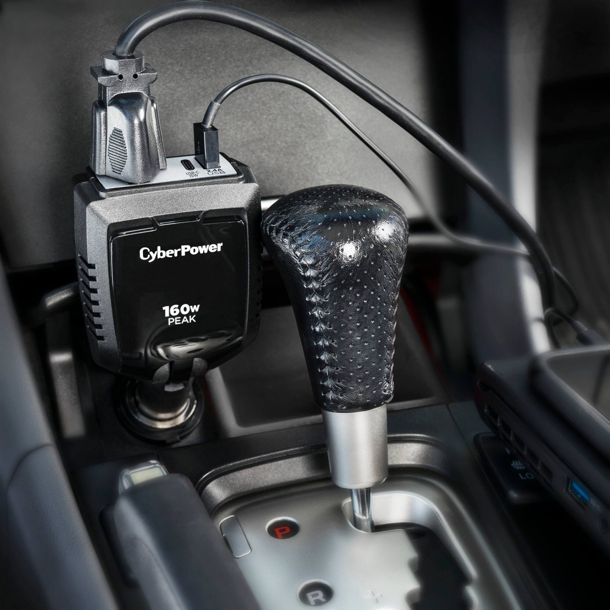 The text on the image reads "CyberPower 160w PEAK  LO P R." This text is likely related to the electronic device in the car, which is a CyberPower 160w PEAK  LO P R.