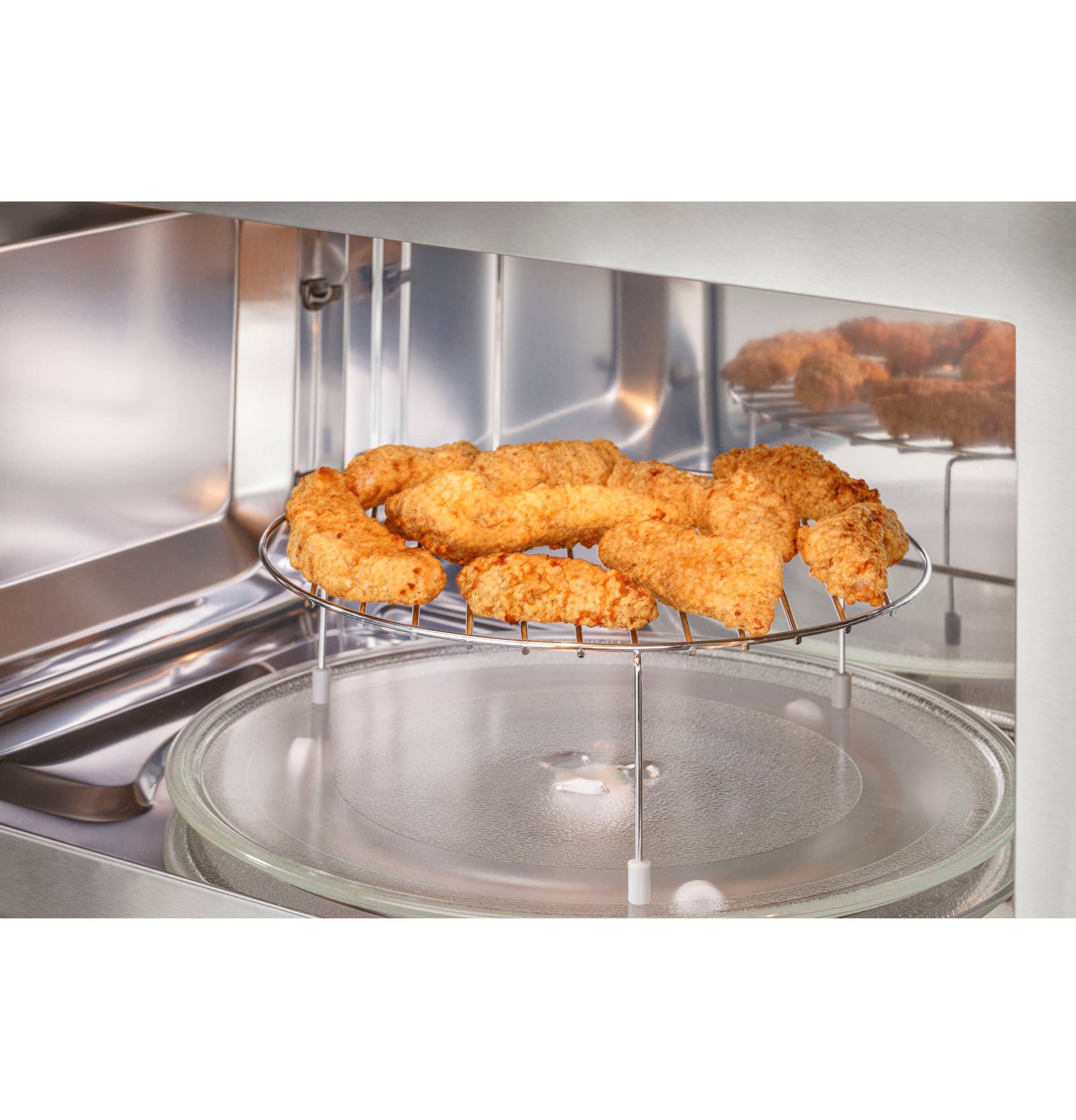 Alt View 3. GE Profile - 1.7 Cu. Ft. Convection Over-the-Range Microwave with Sensor Cooking and Air Fry - Stainless Steel.