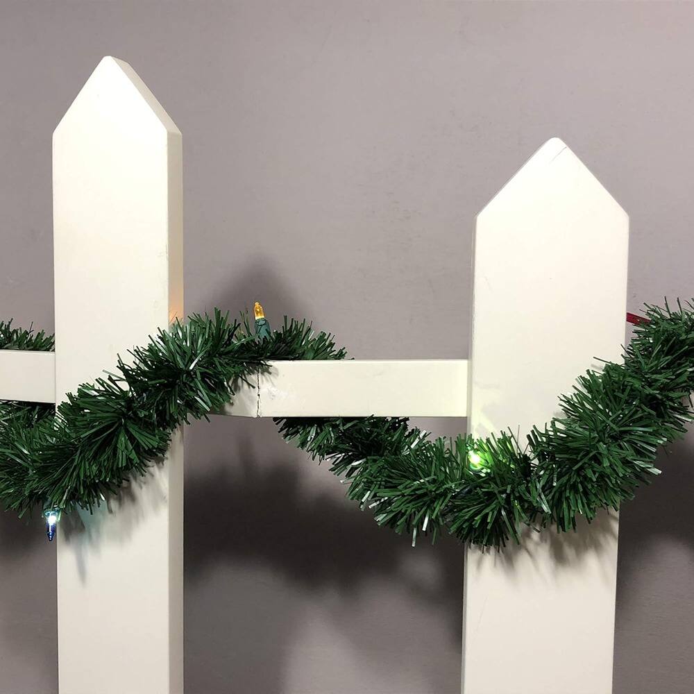 Angle. PARKER SLATER - 12ft Pre-Lit Christmas Garland with Multi Lights, Pine Greenery Indoor/Outdoor - Green.