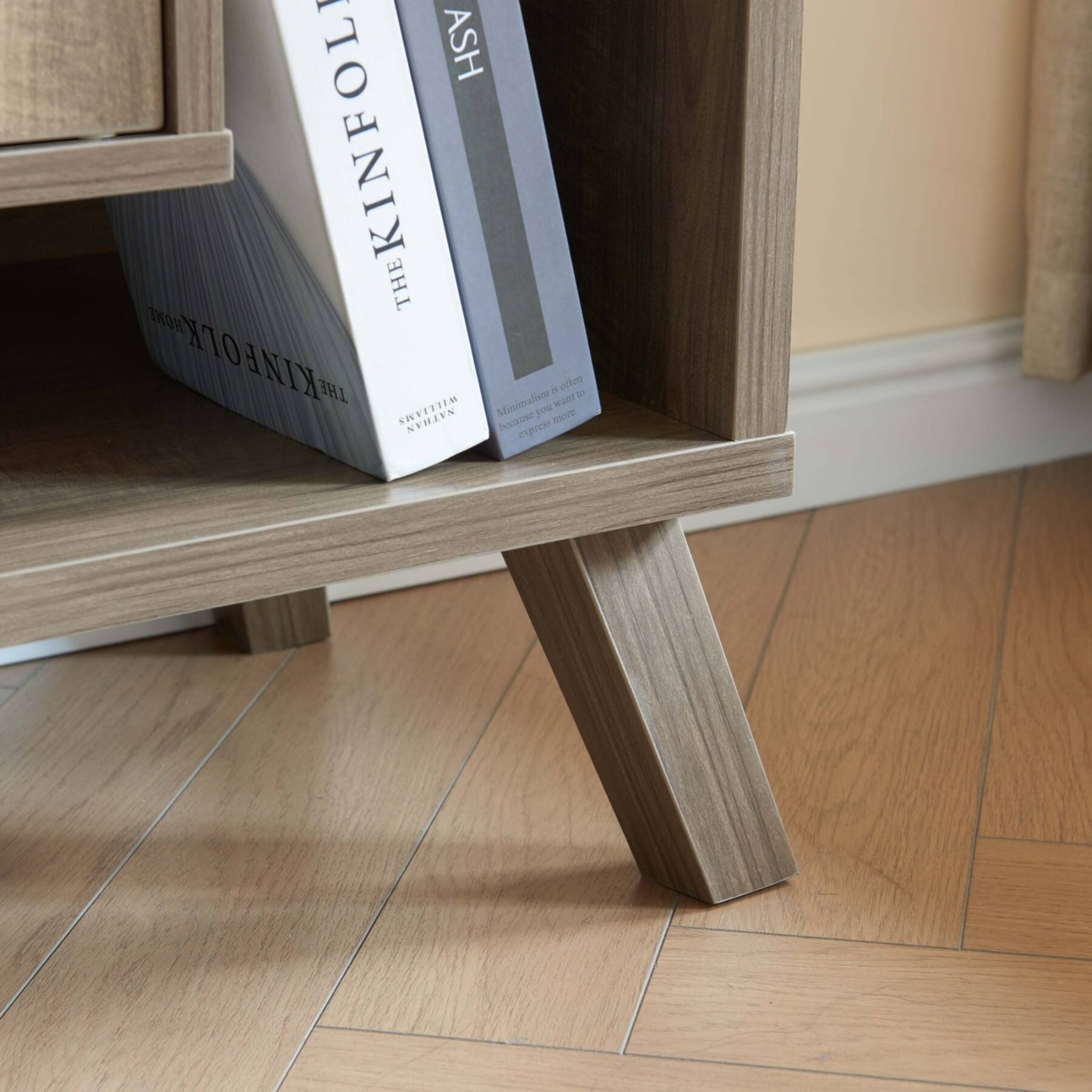 The text on the image reads:

"ASH
KINFOLK

THE KINFOLK
ETHELTON

Minimalism is often
more
than you
expect

KINFOLK
ETHLTON"