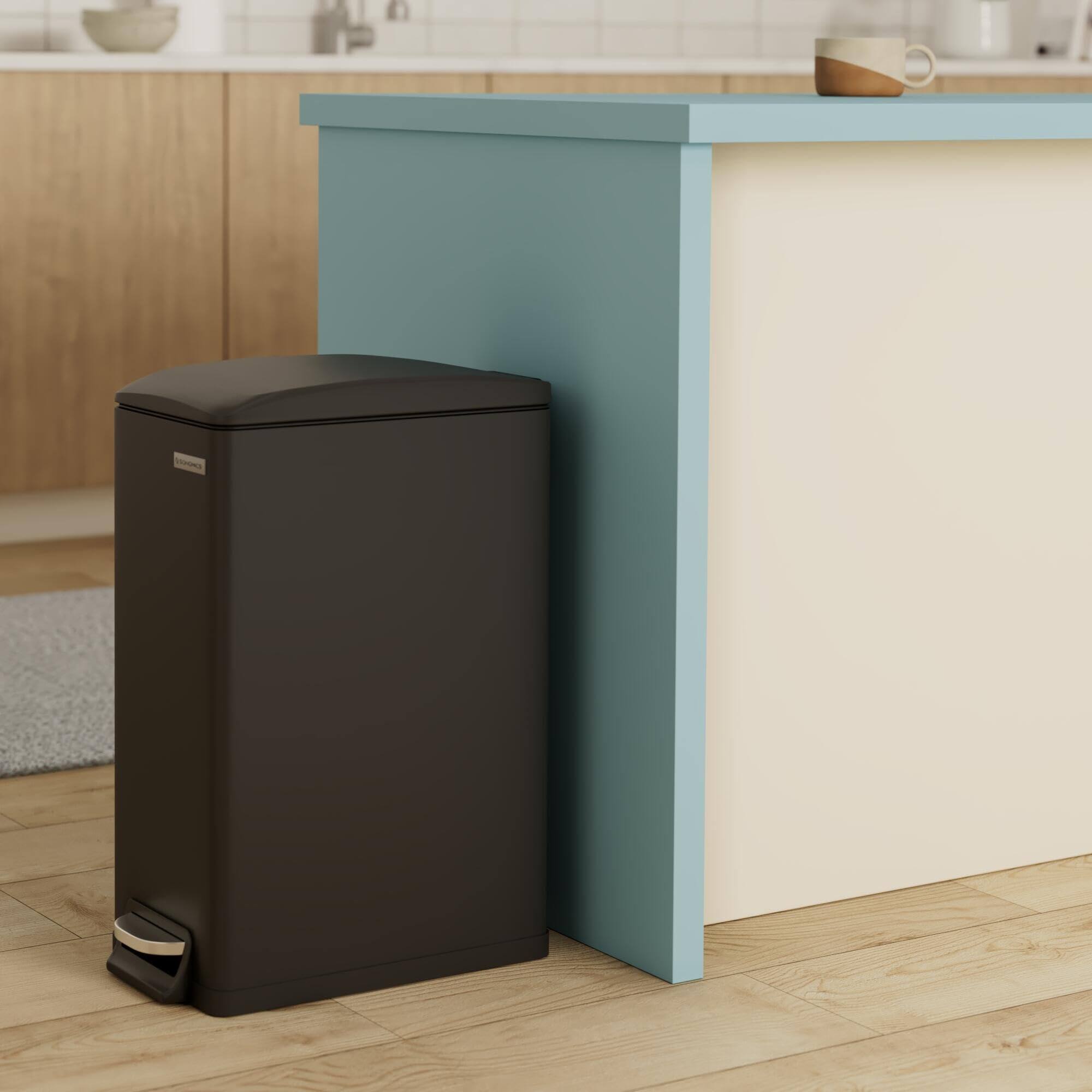 Angle. Songmics Home - 13-Gallon (50L) Slim Stainless Steel Trash Can with Soft-Close Lid in Black (15 Trash Bags Included).