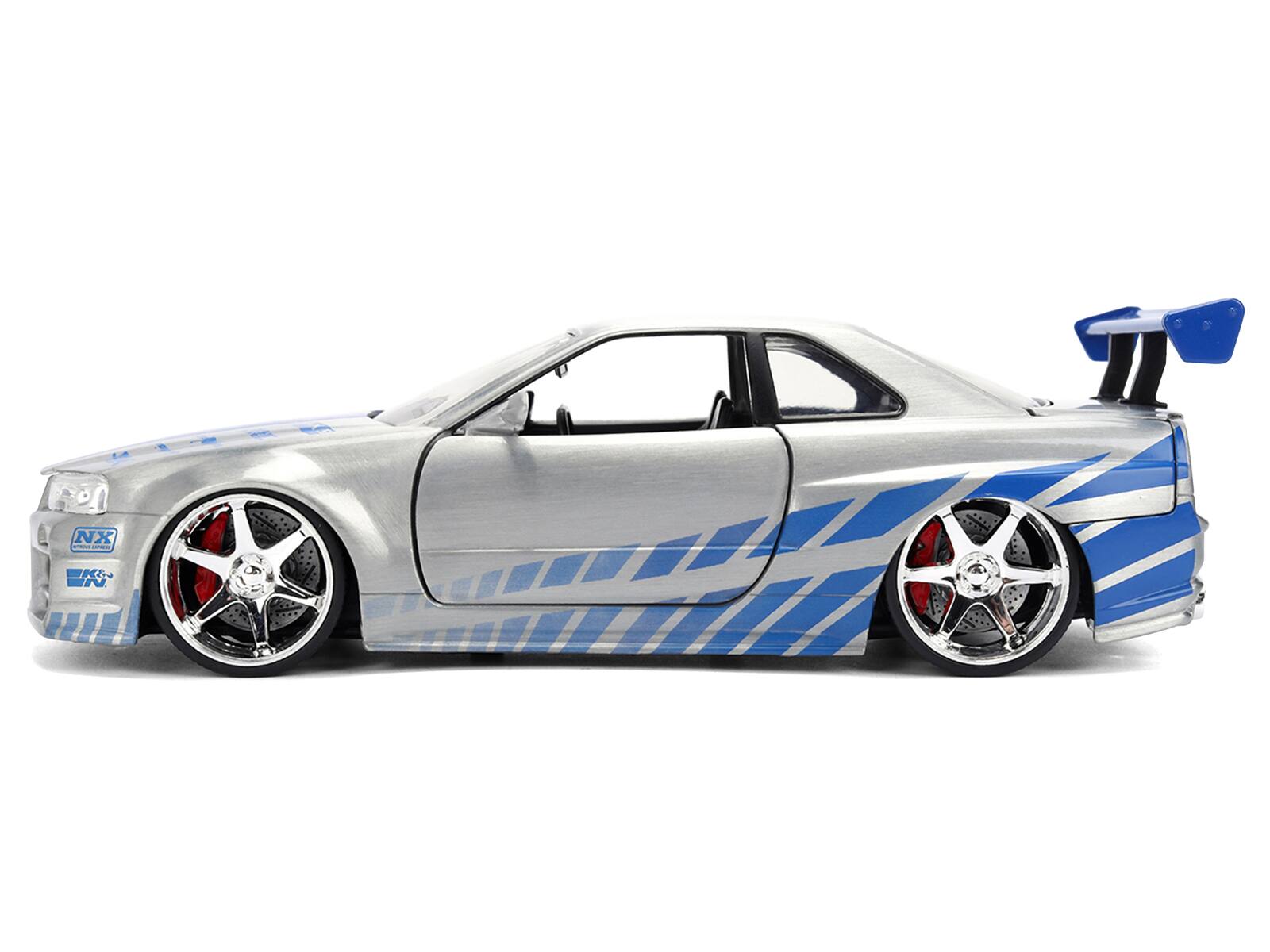 Alt View 2. Jada - Brian's Nissan Skyline GT-R (R34) RHD Brush Finish "2 Fast 2 Furious" 2003 1/24 25 Years of Fast & Furious Anniv by Jada.