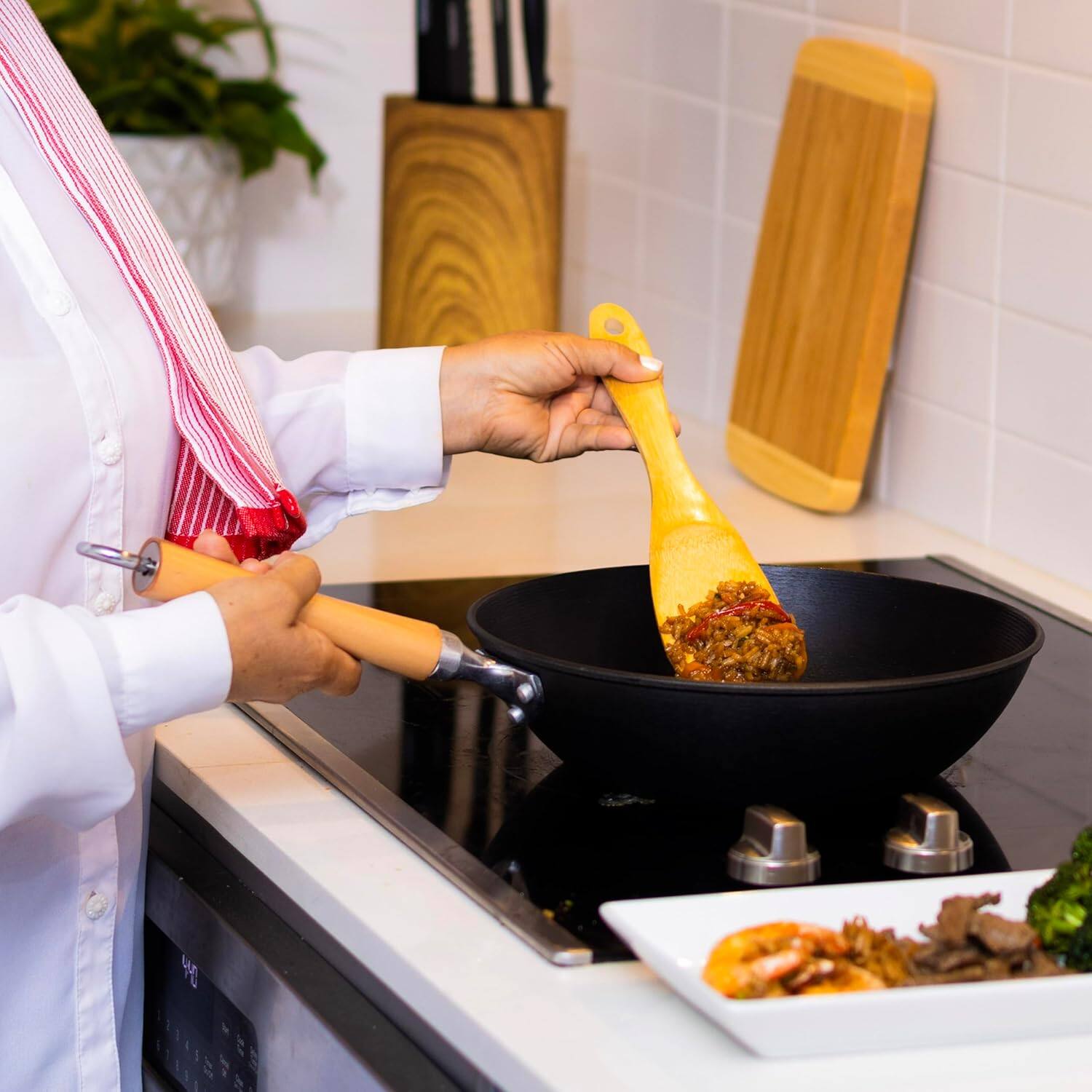 Alt View 8. Escali - Joyce Chen Professional Series 11.5-Inch Preseasoned Cast Iron Stir Fry Pan with Maple Handle - Black.