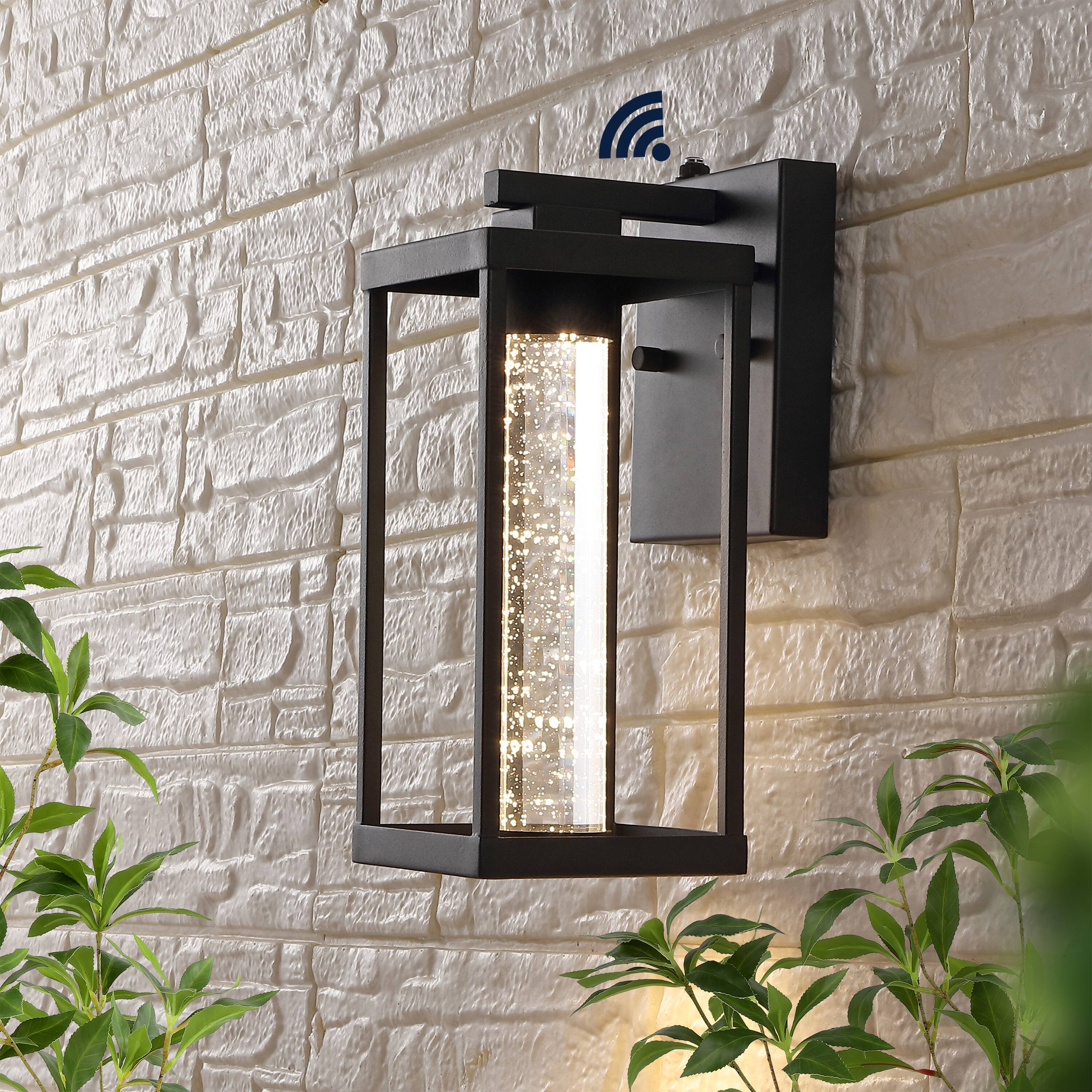 Alt View 1. Jonathan Y - Juno 4.75" 1-Light Industrial Vintage Iron/Seeded Glass with Dusk-to-Dawn Sensor Integrated LED Outdoor Sconce, Black - Black.