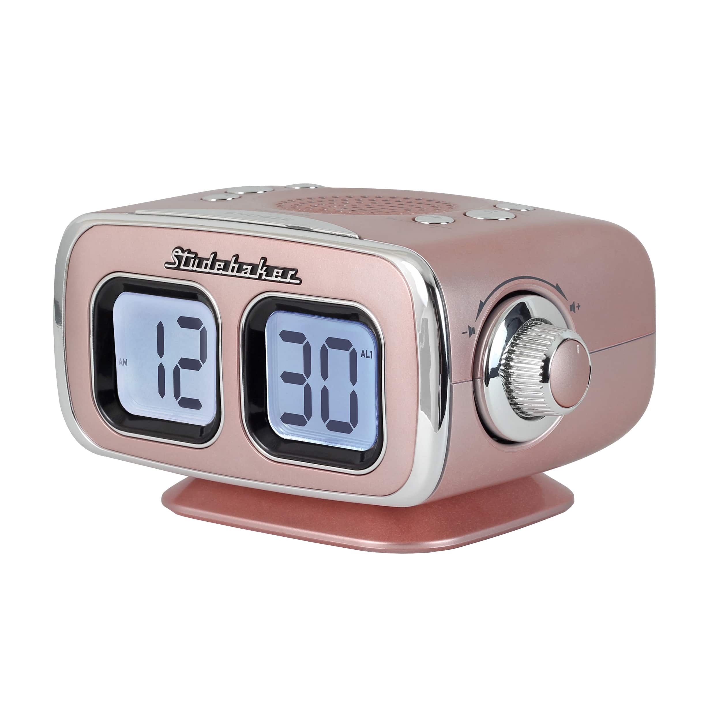 Stidehaker alarm clock with a pink case and silver trim. The time displayed is 12:30.