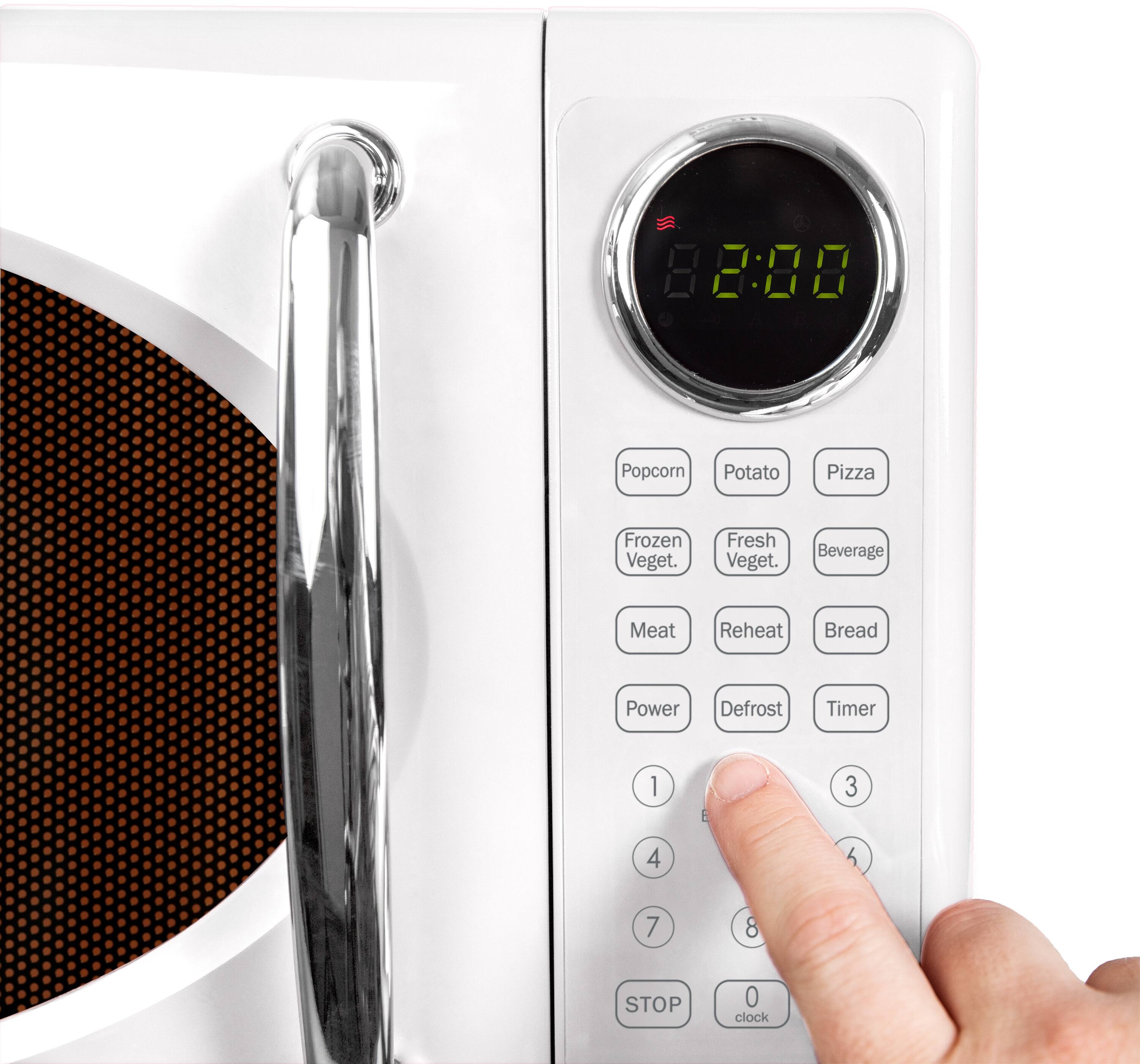 8:88 Popcorn Potato Pizza Frozen Veget. Fresh Veget. Beverage Meat Reheat Bread Power Defrost Timer 1 2 3 4 5 6 7 8 STOP 0 clock