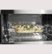 Alt View Zoom 13. GE Profile - 1.7 Cu. Ft. Convection Over-the-Range Microwave with Sensor Cooking - Black.