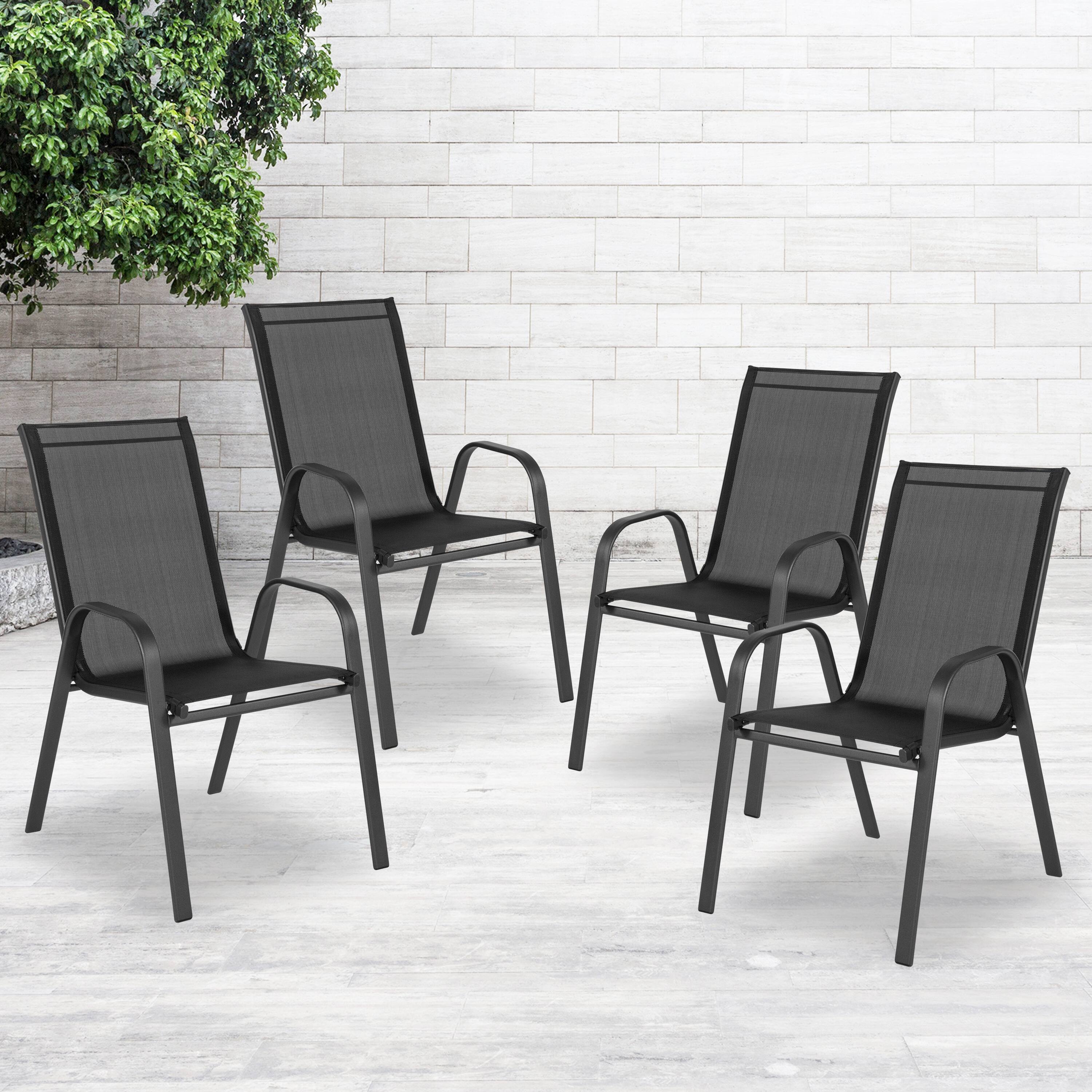 Alt View 2. Emma + Oliver - 4 Pack Outdoor Stack Chair with Flex Comfort Material - Patio Stack Chair - Black.