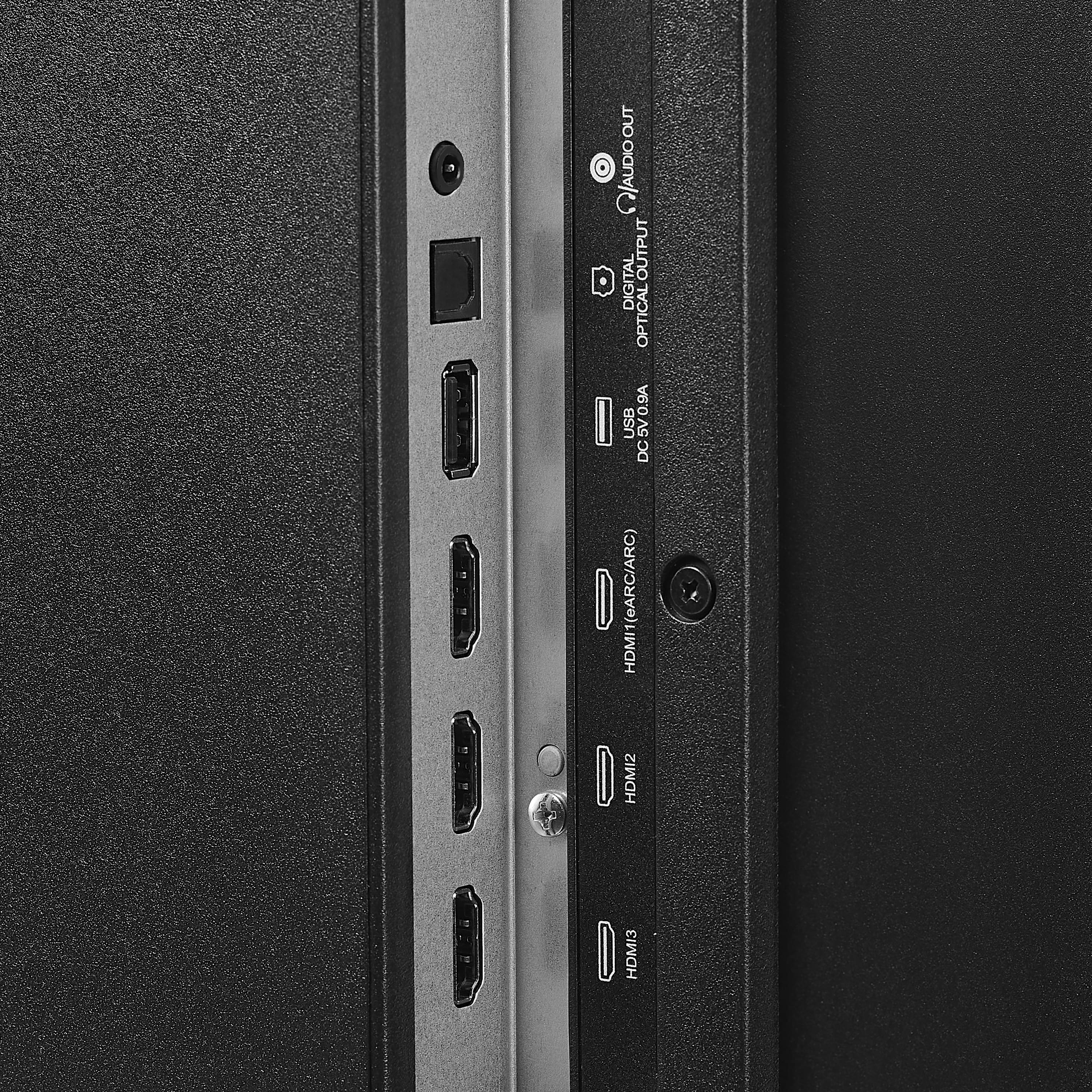 The text on the image reads: "Q/AUDIOOUT OUTPUT . DIGITAL OPTICAL 0.9A USB DC SV 0.9A DC 1(eARC/ARC) HDMI HDMI2 I HDMI3." This text is likely describing the various ports and features available on the back of the device. The ports include USB, HDMI, and digital optical audio output. The device also supports eARC/ARC, which is an advanced audio return channel technology for HDMI connections.