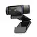 The image features a Logitech webcam that is mounted on a stand. The webcam is designed to capture high-definition video, with a resolution of 1080p. The stand provides a stable and adjustable platform for the webcam, allowing users to easily position it for optimal viewing angles and distances.