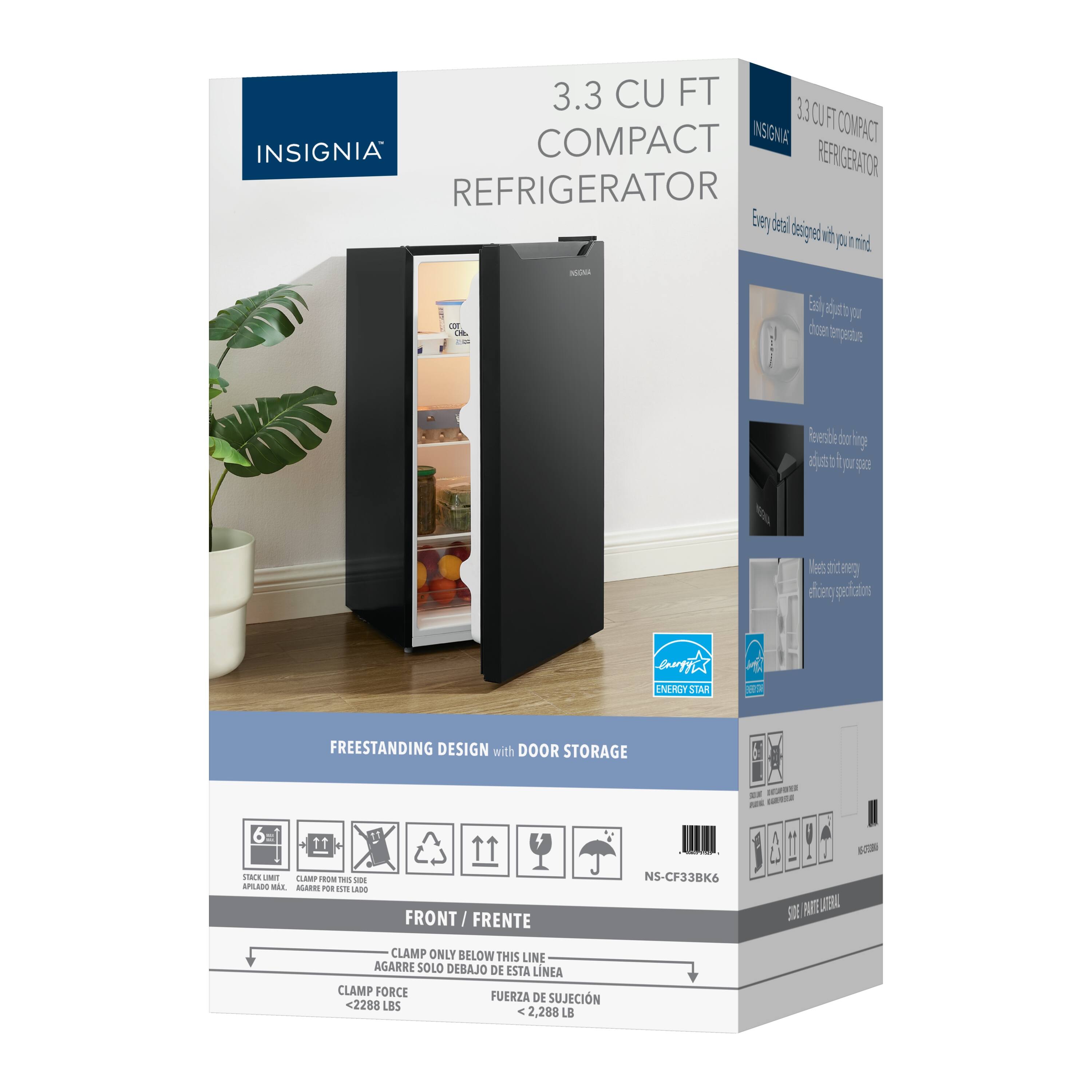 The text on the image reads: "3.3 CU FT COMPACT INSIGNIA REFRIGERATOR - FREESTANDING DESIGN with DOOR STORAGE - 6 CANS FRONT - APLANE MAGNET - CLAMP ONLY BELOW THIS LINE - AGARRE SOLO DEBAJO DE ESTA LNEA - CLAMP FORCE - 2,288 LBS."