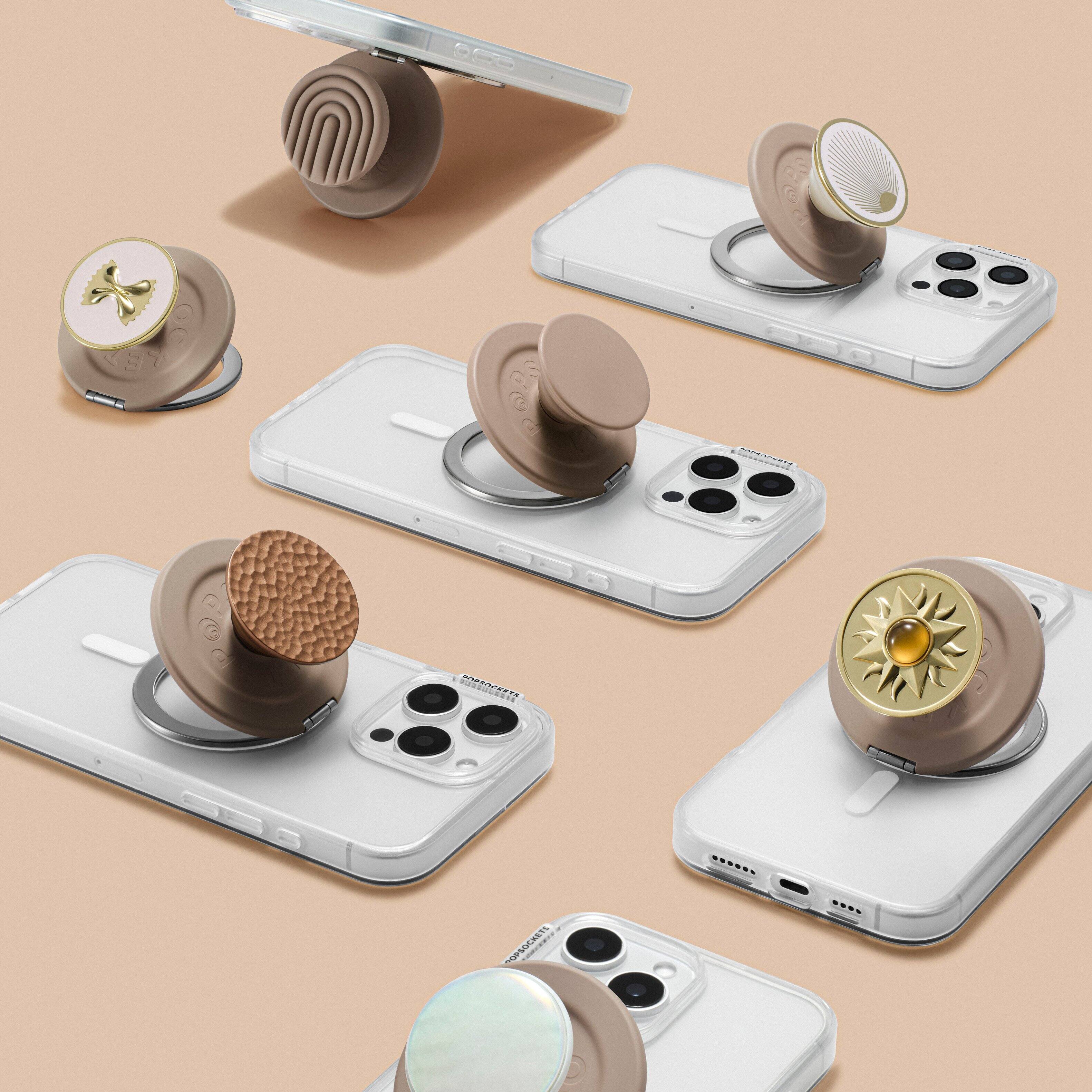 The image features a collection of six cell phones with different colored buttons. Each phone has a unique design, showcasing a variety of styles and colors. The phones are arranged in a visually appealing manner, likely to attract the attention of potential buyers or users. The image highlights the diversity and creativity of the cell phone designs, making it an interesting and engaging visual display.