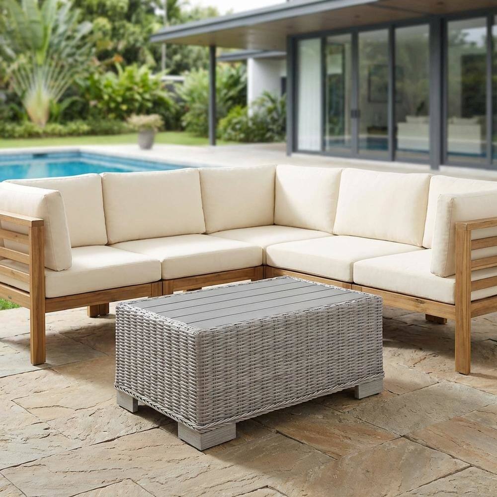 Left. Outdoor Escape - Outdoor Wicker Rattan Coffee Table, Weather-Resistant Finish For Patio Lounge - Gray.