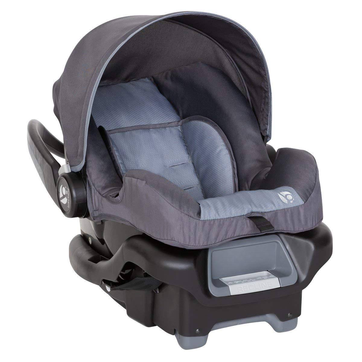 Left. Reds Spade - Expedition Race Tec Jogger Travel System With Ally Car Seat Ultra Grey - Ultra Black Plus Travel System.