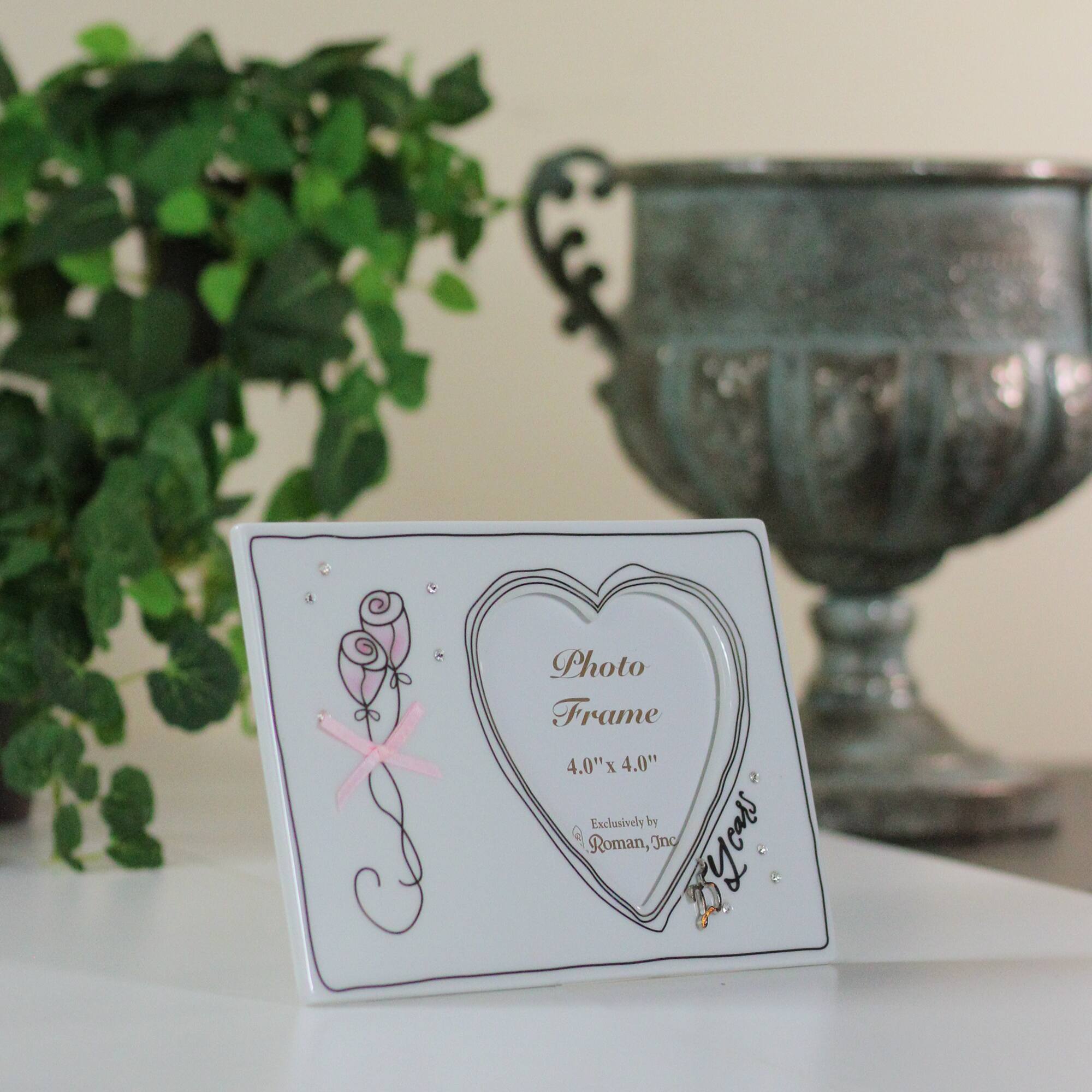 Photo Frame  
4.0" x 4.0"  
Exclusively by Roman, Inc.  
Byeals