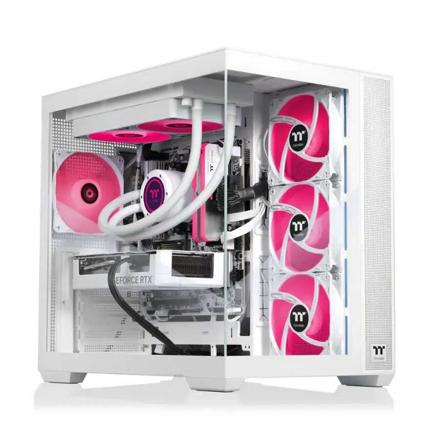 The image shows a white and pink computer case with a transparent side panel. The case is filled with various computer components, including a motherboard, a graphics card, and a power supply. The case also features a pink and white design, with pink accents on the fans and other parts. The transparent side panel allows for a clear view of the internal components, making it easier to see the setup and maintenance of the computer.