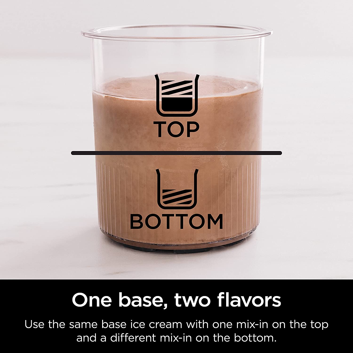 One base, two flavors

Use the same base ice cream with one mix-in on the top and a different mix-in on the bottom.