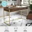 Martha Stewart desk available in multiple finishes, spacious table top, and adjustable floor glides.