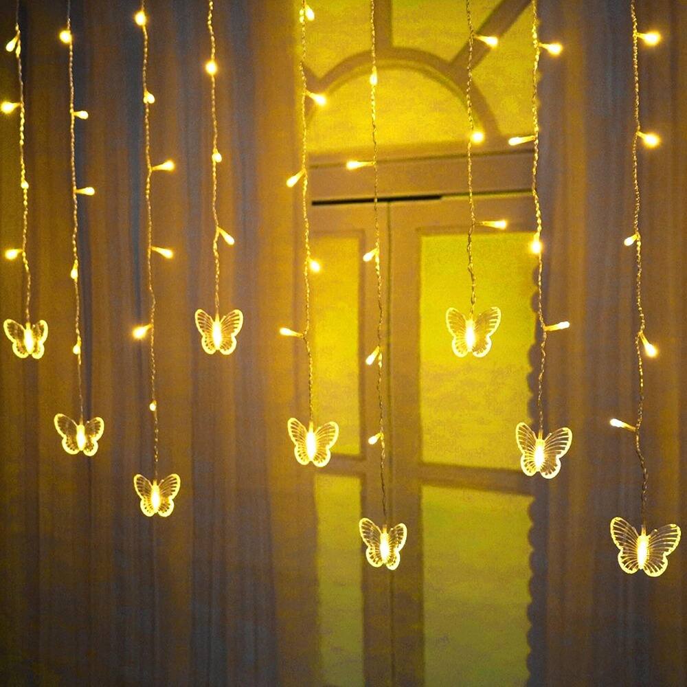 Left. MOSZAR LLC - Butterfly Curtain Fairy Lights – 120 LEDs, USB, Warm White.