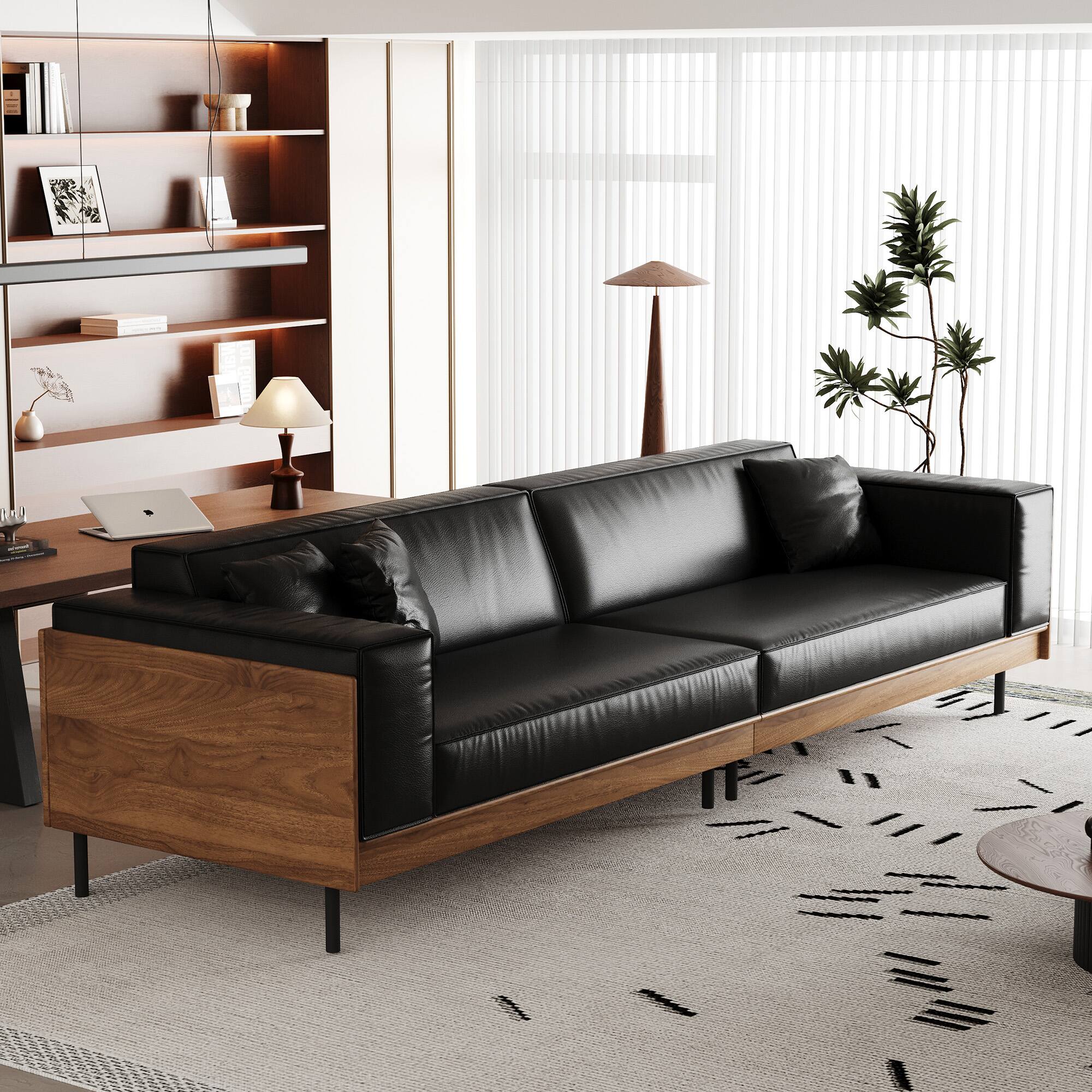 Left. luck idea - Modern Leather Sofa 106.3" Wide with Solid Wood Frame, Metal Legs and 3 Decorative Pillows - Black.