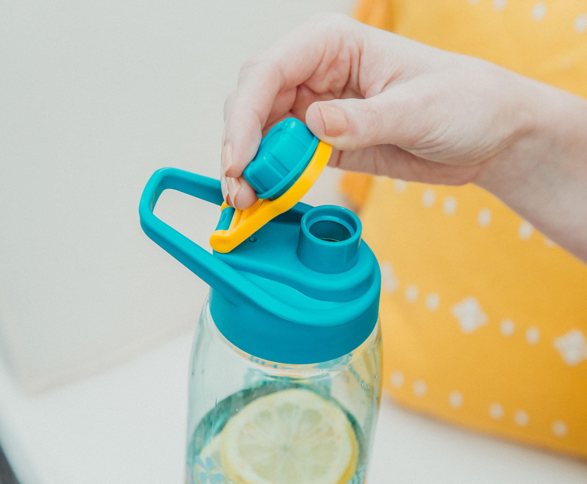 Alt View 3. Silver Buffalo - Disney Lilo & Stitch Tropical Water Bottle With Time Table | Holds 28 Ounces - Blue.