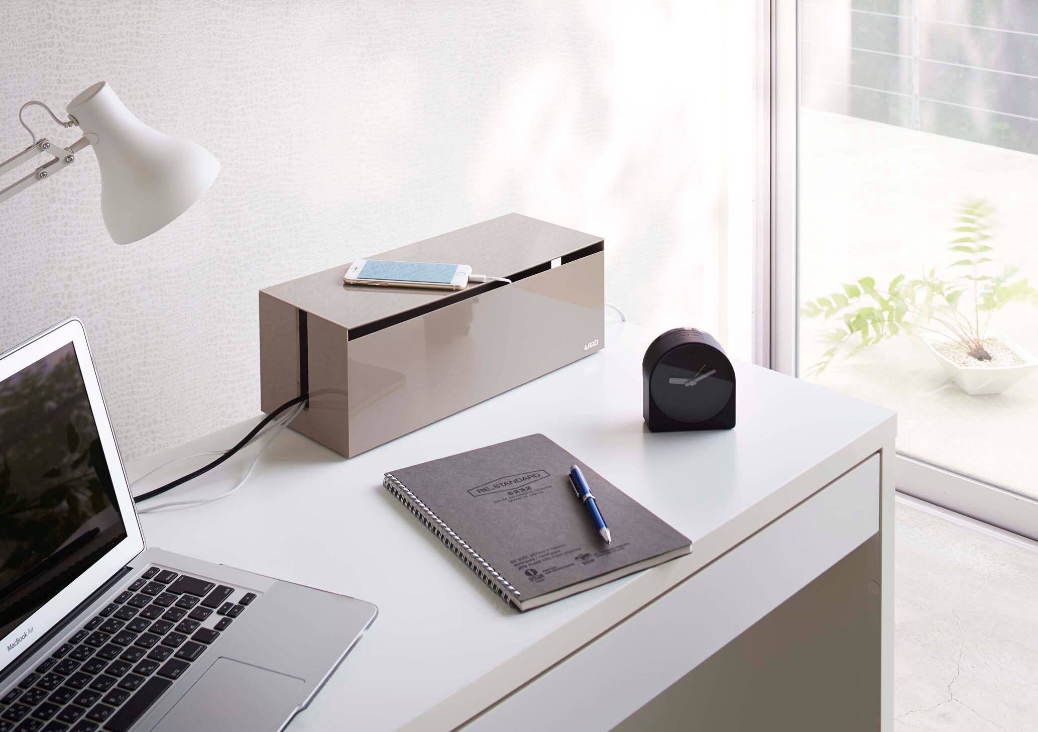 The text on the image reads:

"THE STANDARD
Notebook
2022"