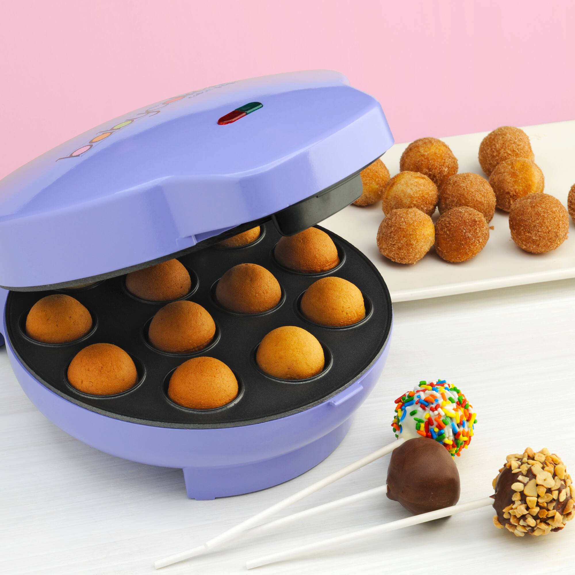 Left. Babycakes - Cake Pop Maker - Purple.