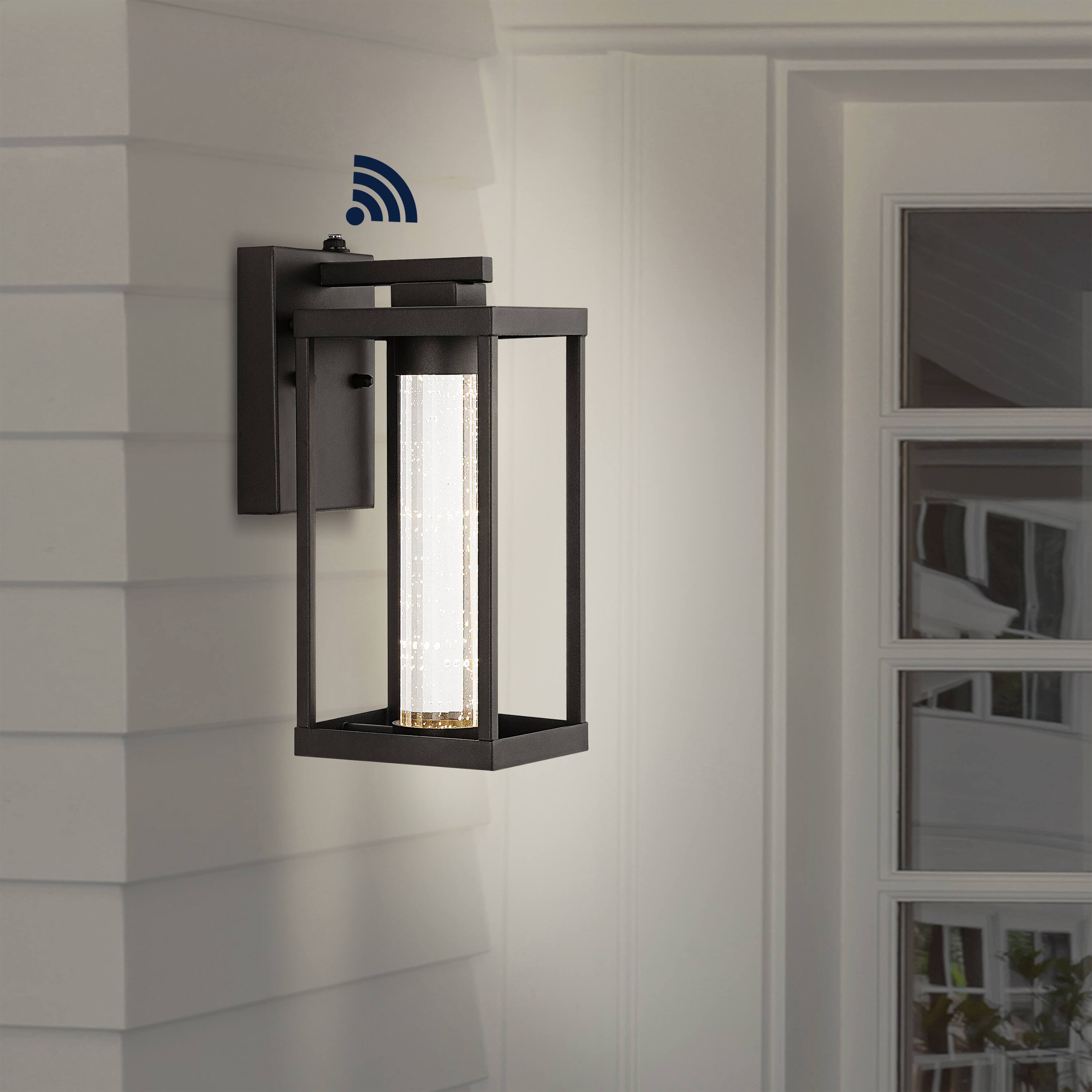 Alt View 6. Jonathan Y - Juno 4.75" 1-Light Industrial Vintage Iron/Seeded Glass with Dusk-to-Dawn Sensor Integrated LED Outdoor Sconce, Black - Black.