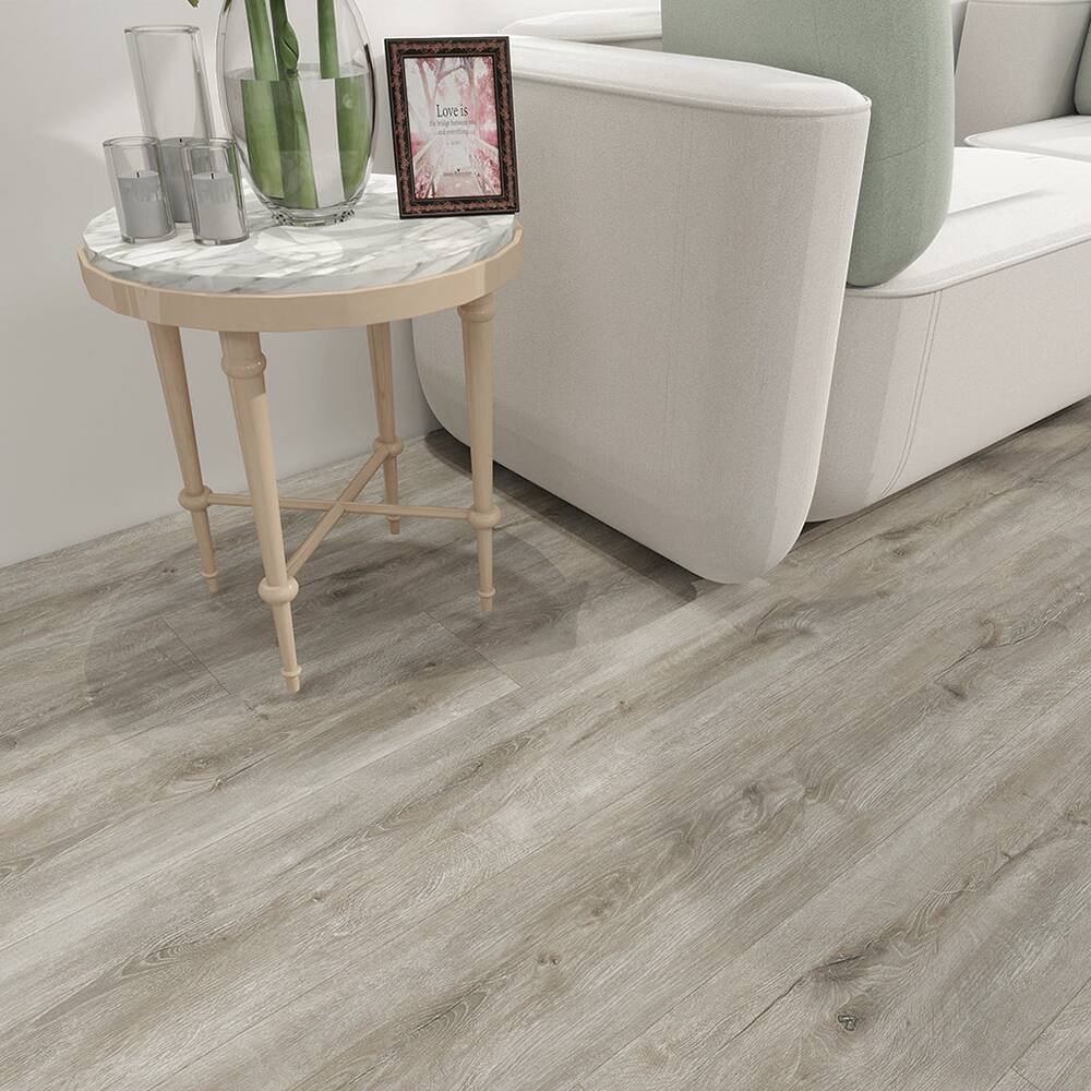 Angle. Dotfloor - 62.6"x9" SPC Composite Flooring; 5 Planks/Box (19.56 sq. ft/Box); 8mm Thick with ; 30 mil Wear Layer; - White Stone.