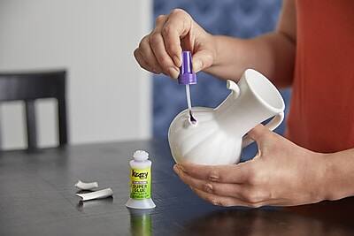 The text on the image reads:

"KEATY SUPER GLUE"