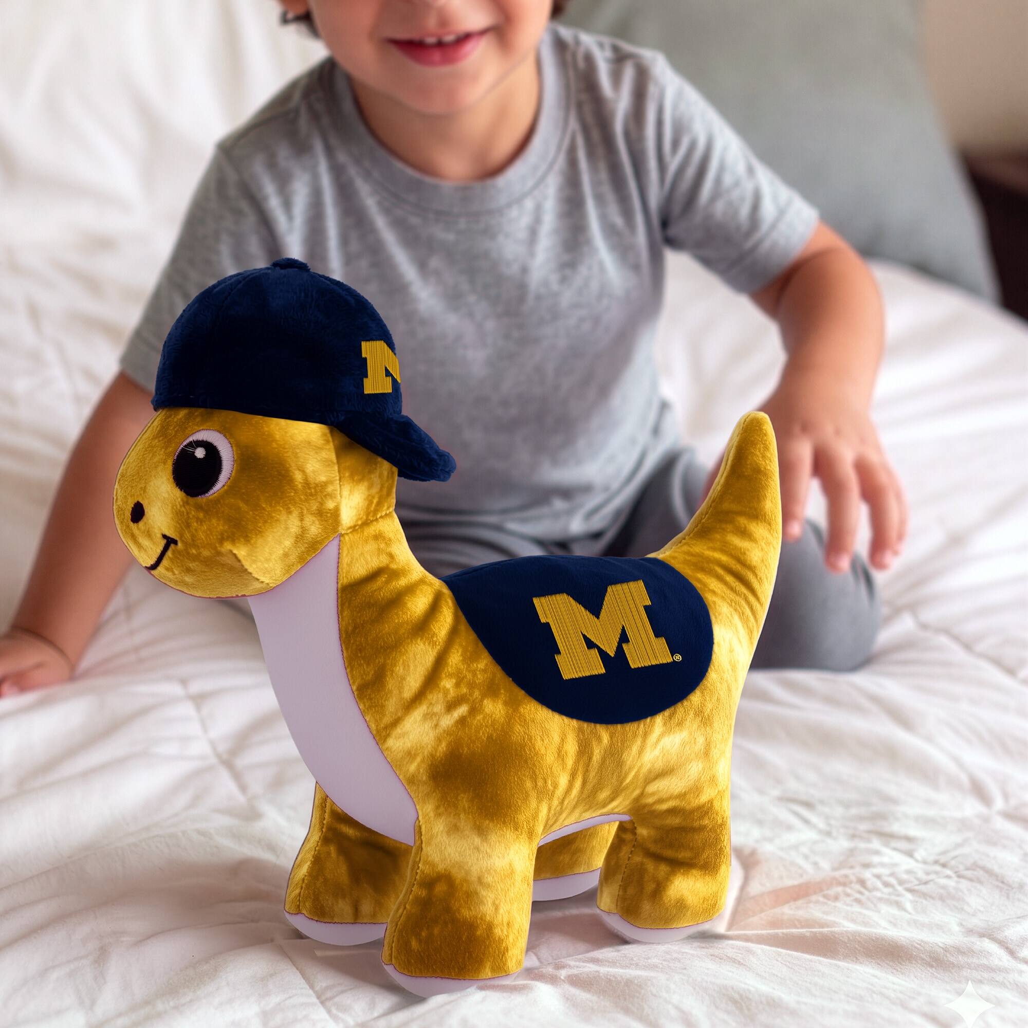 Alt View 2. Sporticulture - Michigan Wolverines Huddle Plush Fanasaur - Multicolor.