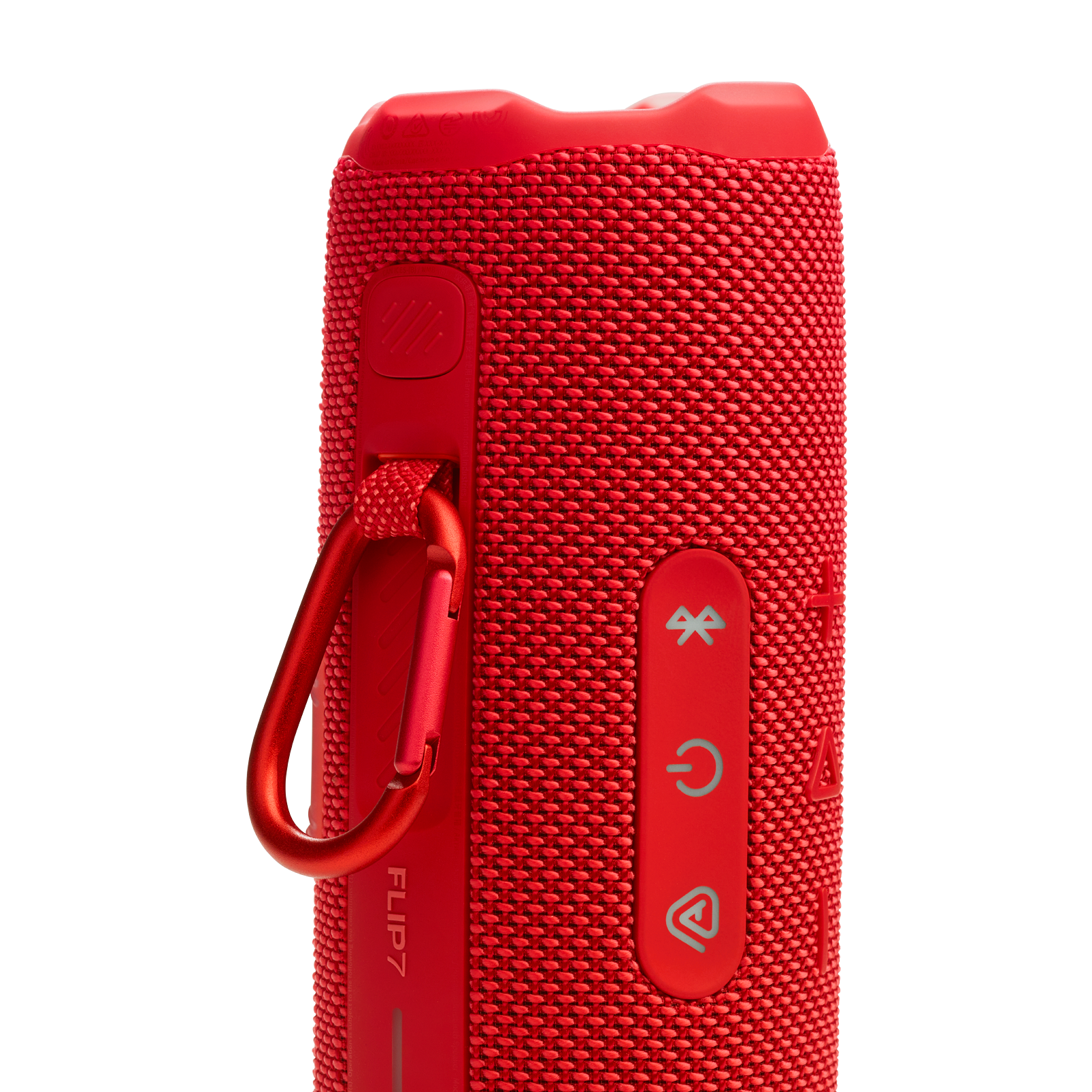 The image features a red Flip 7 speaker, which is a portable and compact device. The speaker is designed to be hung on a hook or attached to a bag, making it convenient for outdoor activities or traveling. The Flip 7 speaker has a built-in clip and a red strap, allowing users to easily carry it around. The speaker is equipped with a USB port and a power button, making it easy to charge and control the device.