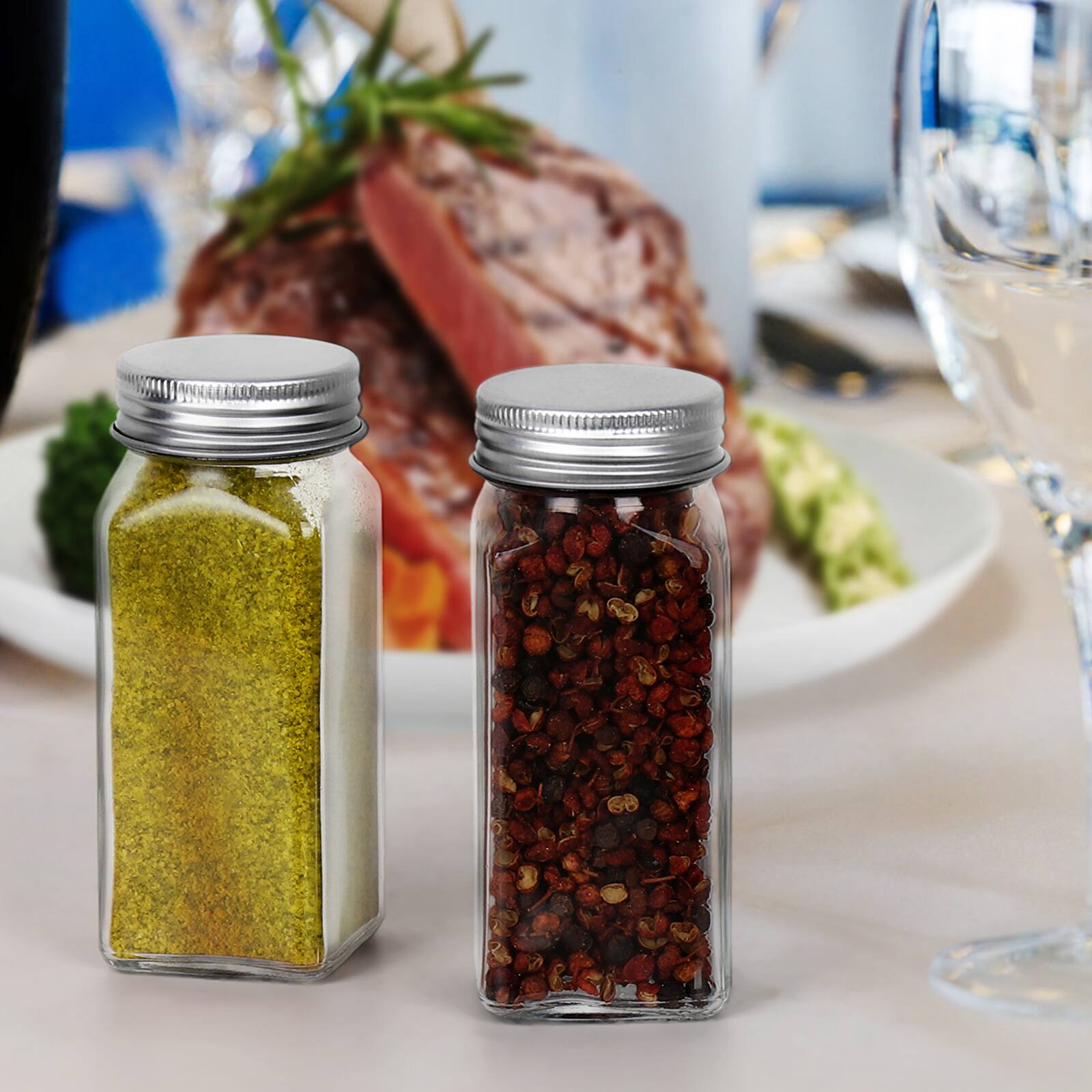 Alt View 2. Oumilen - 24-Pack Glass Spice Jars with Silver Metal Lids, 4 oz Square Seasoning Containers for Kitchen Organization.