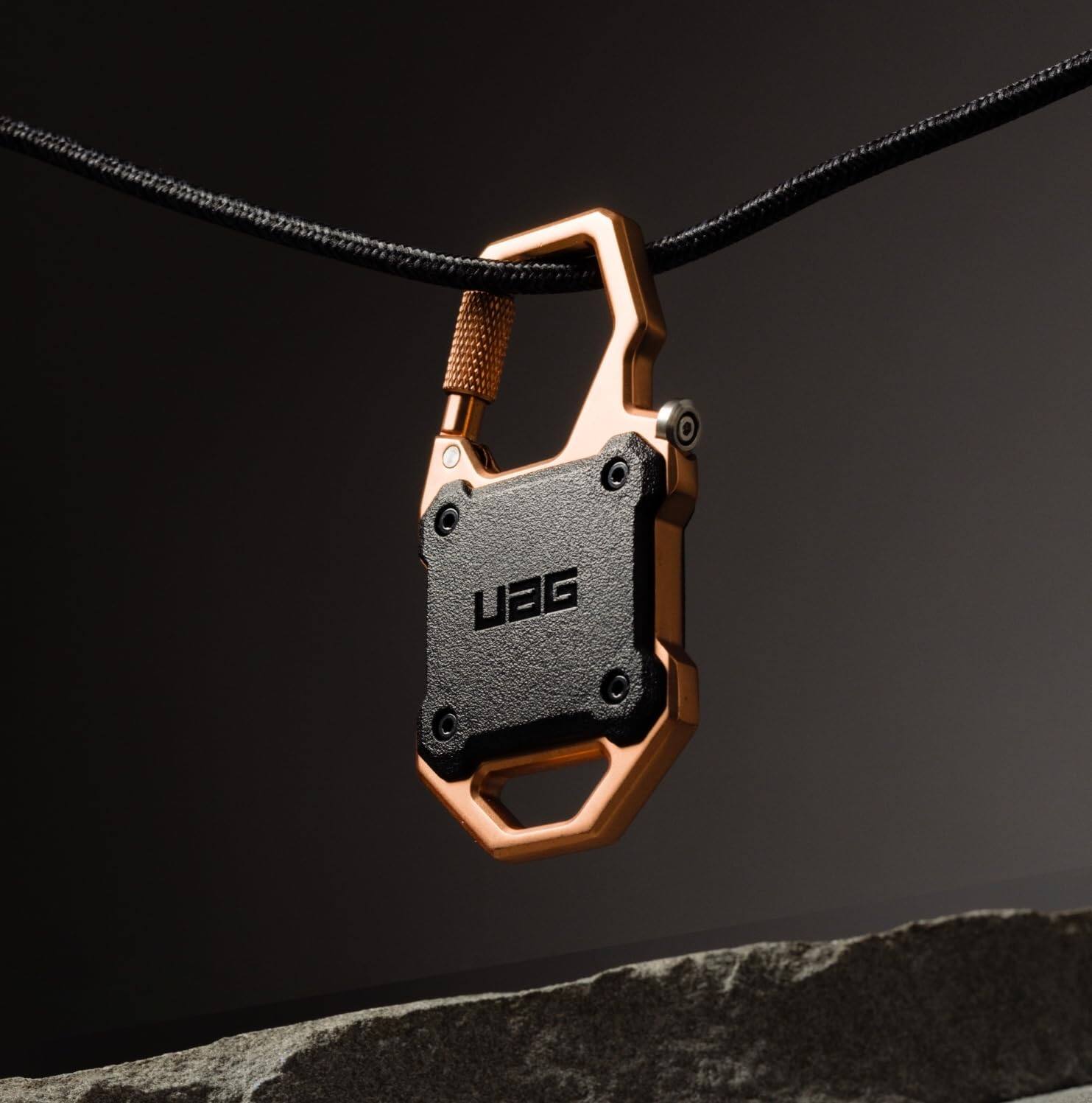 Alt View 1. UAG - AirTag Case w Built-in Bottle Opener & Carabiner for Keys, Luggage & Bags - Black/Copper.