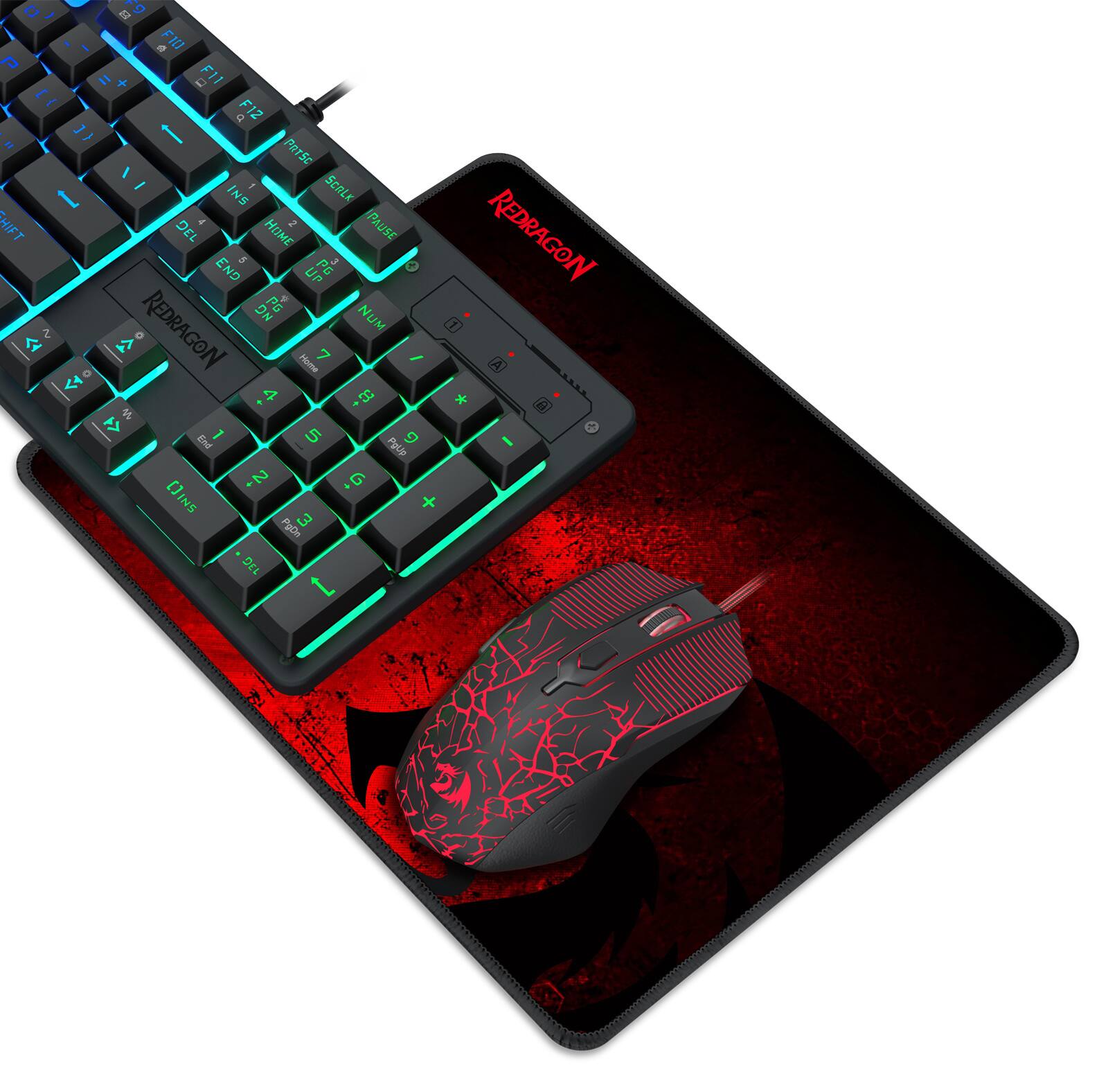Sure, here is the corrected and grouped text from the image:

**Keyboard:**
- REDRAGON
- ESC
- F1 F2 F3 F4 F5 F6 F7 F8 F9 F10 F11 F12
- 1 2 3 4 5 6 7 8 9 0 -
- Q W E R T Y U I O P
- A S D F G H J K L ;
- Z X C V B N M , . /
- SHIFT
- CTRL
- ALT
- HOME END
- PAGE UP PAGE DOWN
- INS DEL
- NUM 7 8 9 + NUM 4 5 6 - NUM 1 2 3 NUM 0 .
- NUM LOCK
- PRTSC SYSRQ
- PAUSE
- SCROLL LOCK
- REDRAGON

**Mouse Pad:**
- REDRAGON

**Mouse:**
- REDRAGON