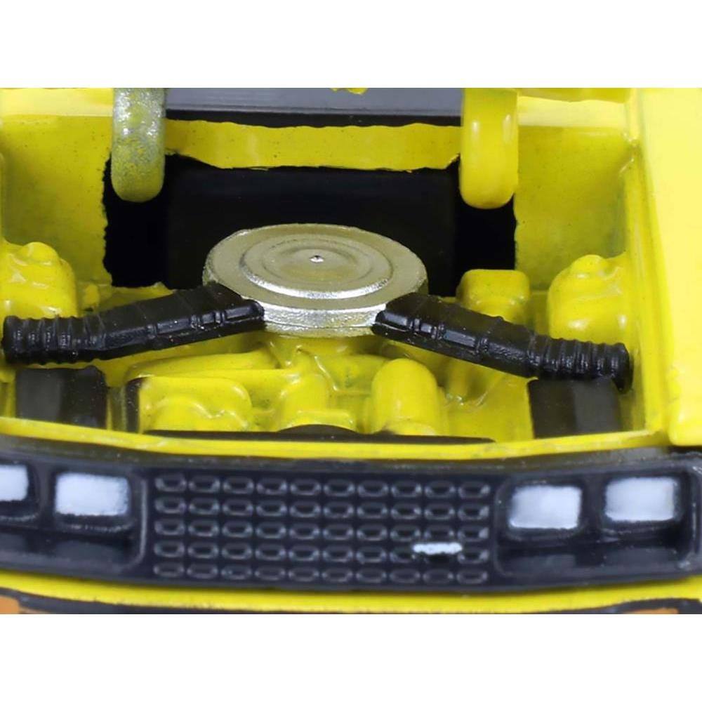 Left. Greenlight - 1979 Ford Mustang Cobra Fastback Bright Yellow with Cobra Good Graphics "GreenLight Muscle" Series 30 1/64 - Yellow with Black.