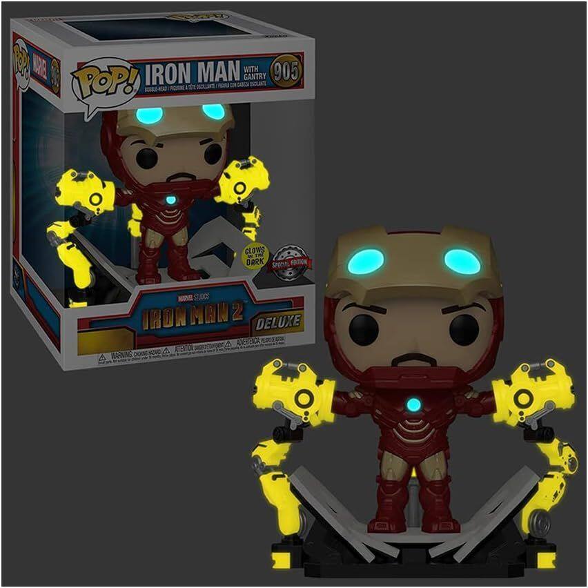 The text on the image is:

"POP! Iron Man with Gantry 903
Iron Man 2 Deluxe
GLOWS IN THE DARK
WARNING: CHOKING HAZARD - Small parts. Not for children under 3 years."