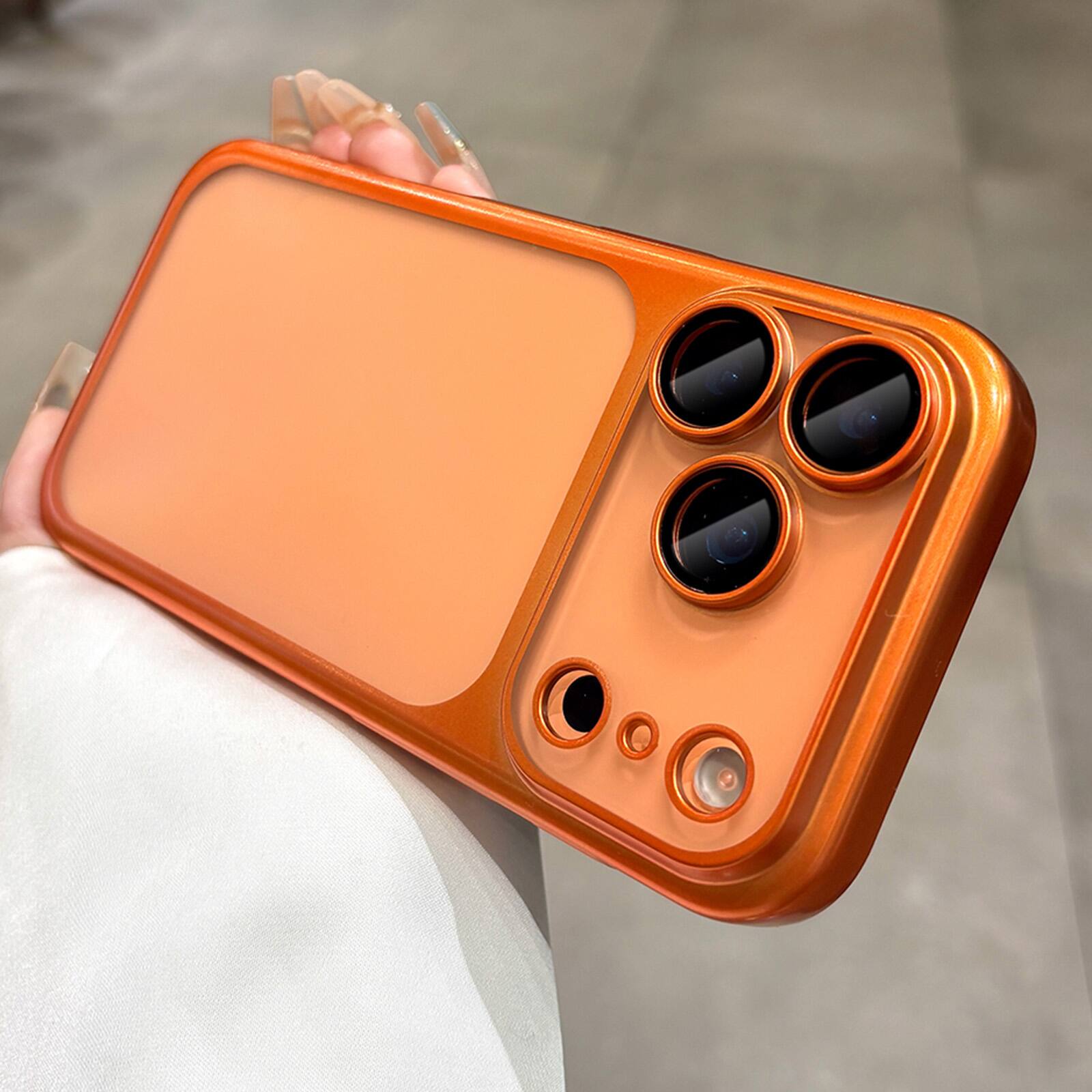 Left. Dteck - Electroplated Ultra-Slim Shockproof Phone Case for iPhone 17 Pro Max, Matte Semi-Transparent Full Camera Protection - Orange.