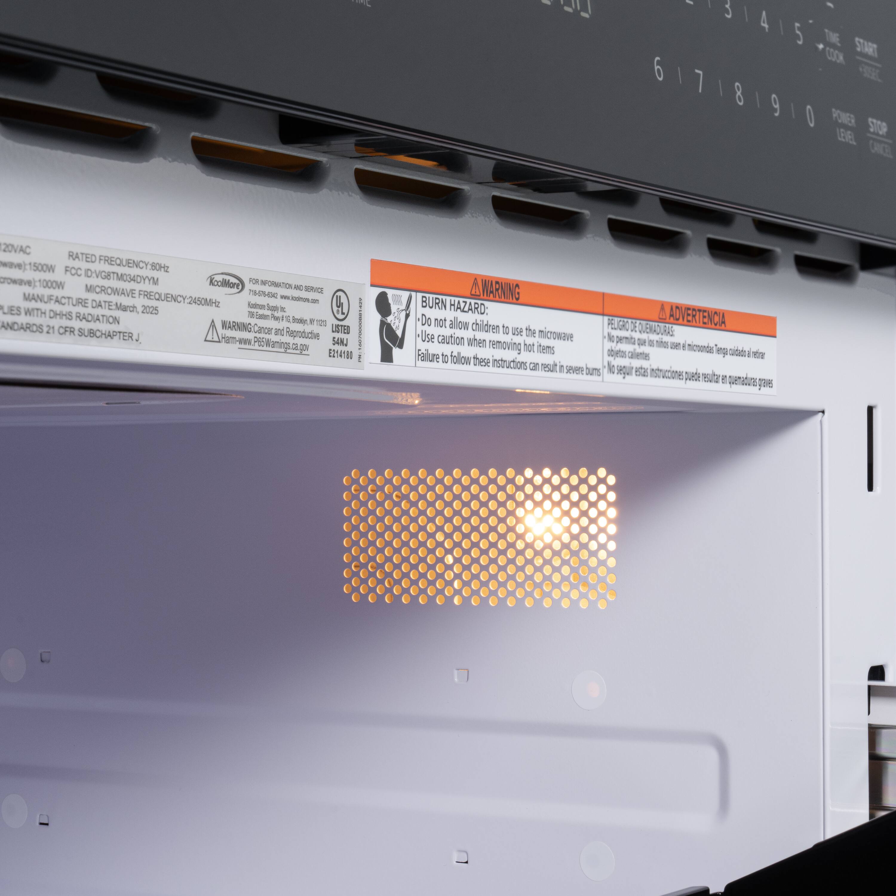 J 6 I 7  I I 8 4 I I 9 5 TNE K00 THATZ I O PONER LEEL STOP DRCE 20VAC RATED FREQUENCY:BOHE wave)j1500W FCC W00OravewO 'VG8TM034DYYM Koolore FOR NFORMATON MICROWAVE B SERVICE FREQUENCY-2450MHZ  - Aus MANUFACTURE DATE:March, Selrun lgh -  LIES WITH 2025 I DHHS RADIATION  S ha 1 brly Y F ANDARDS 21 CFR WARNING.Can Cancer ane LASTED SUBCHAPTERJ Ham-ww Reproducive S4M P85Wanings.ca.gpy EZ418 A WARNING BURN HAZARD: Do A ADVERTENCIA not allow children PE LIG X te ue the microwave QUENADURAS Use caution when ls pemib De a wir removing hot items on  micoonds Failure a shies calets ep cita I sr follow these instructions cn result I severe buns ka aqi  instruciones puate  e seratin aes