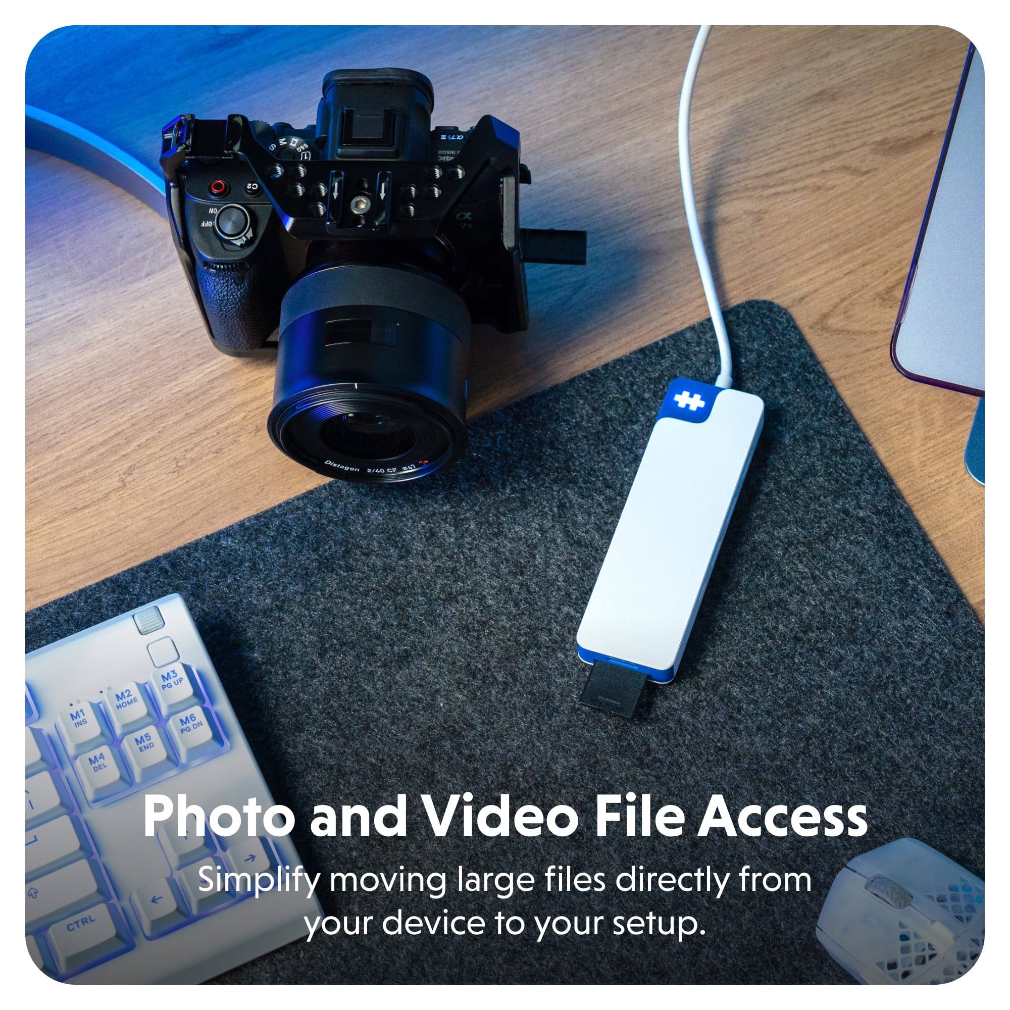 The corrected text is:

"Photo and Video File Access: Simplify moving large files directly from your device to your setup."